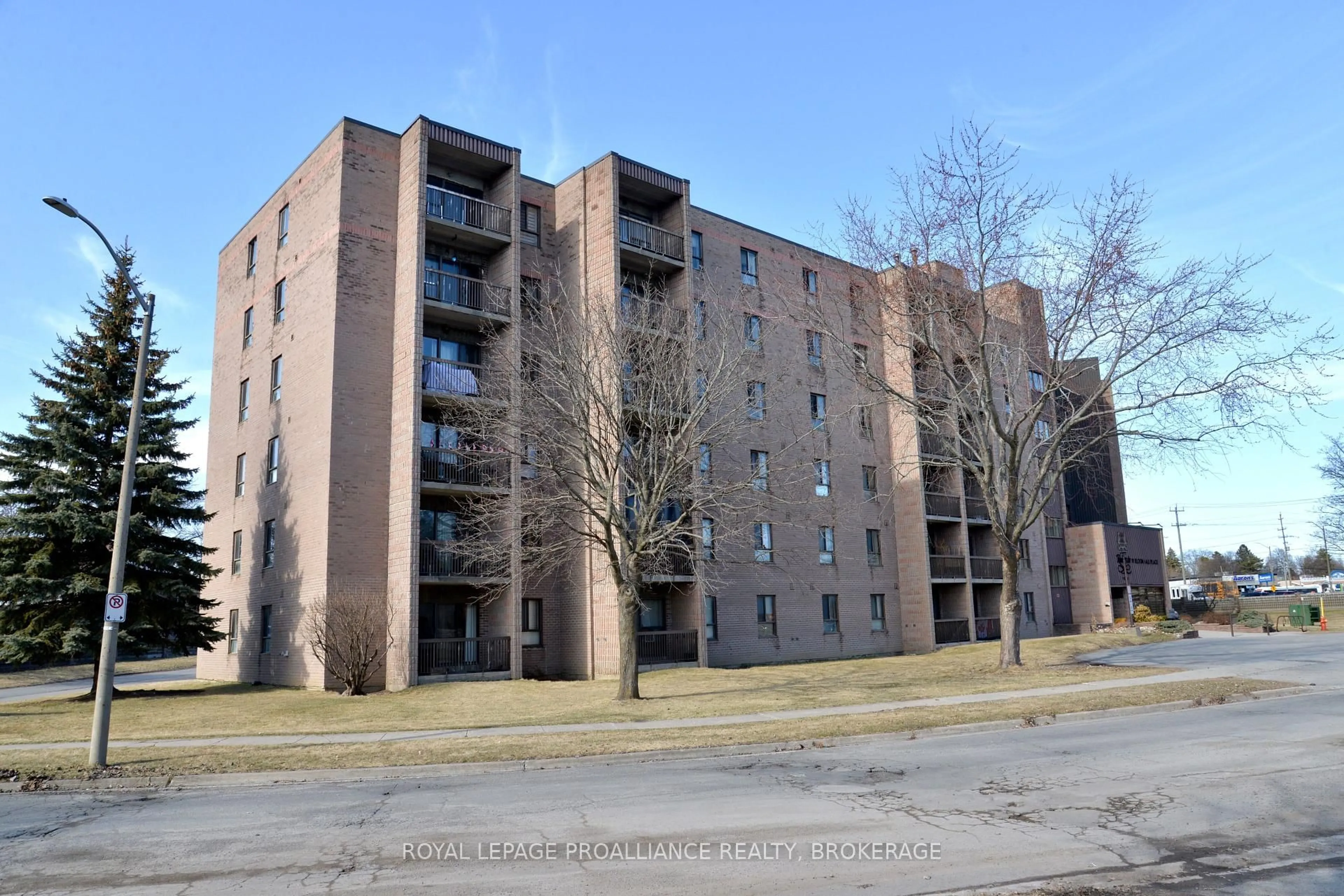 A pic from outside/outdoor area/front of a property/back of a property/a pic from drone, building for 17 Eldon Hall Pl #210, Kingston Ontario K7M 7H5