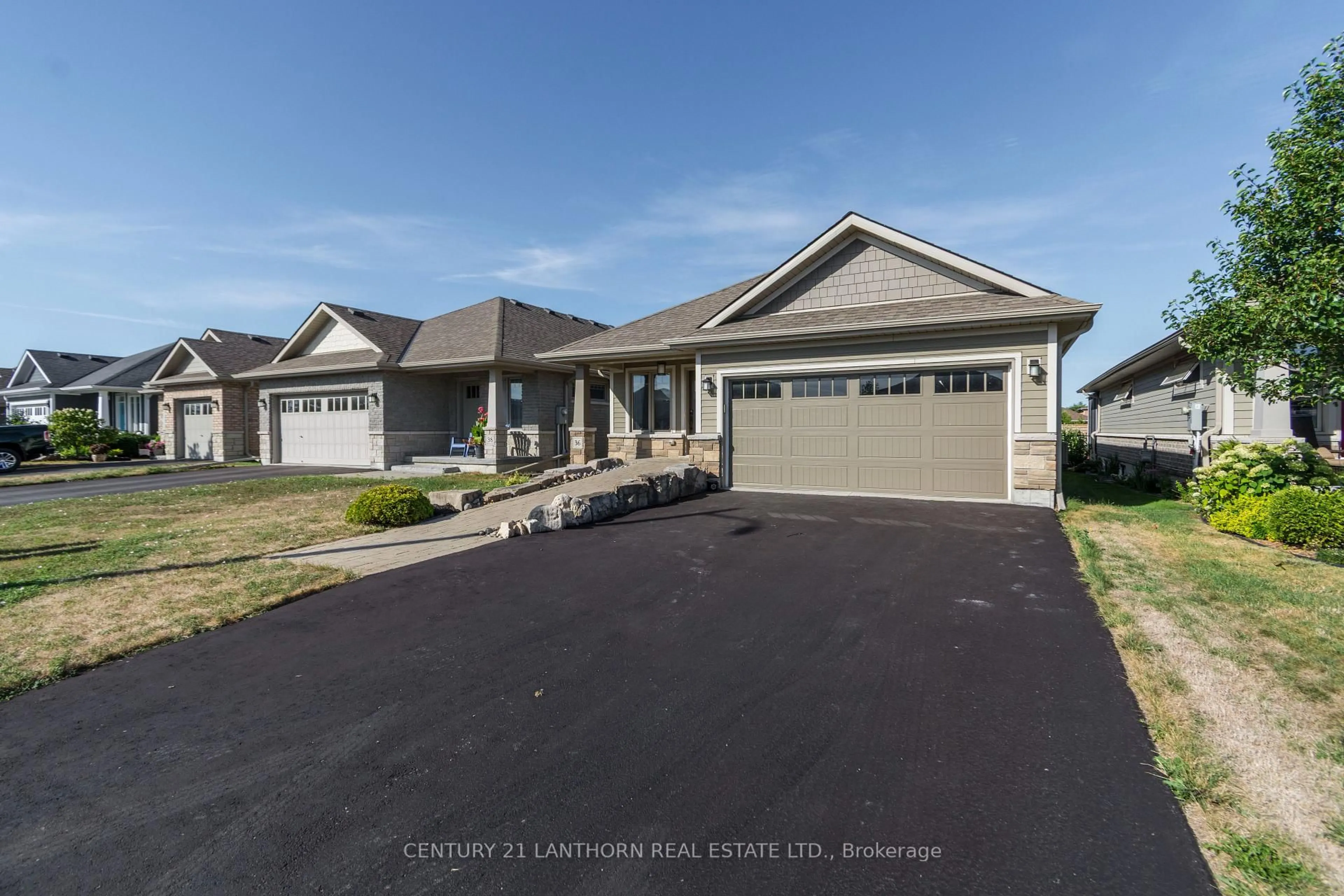 Home with vinyl exterior material, street for 36 Tessa Blvd, Belleville Ontario K8N 4Z5