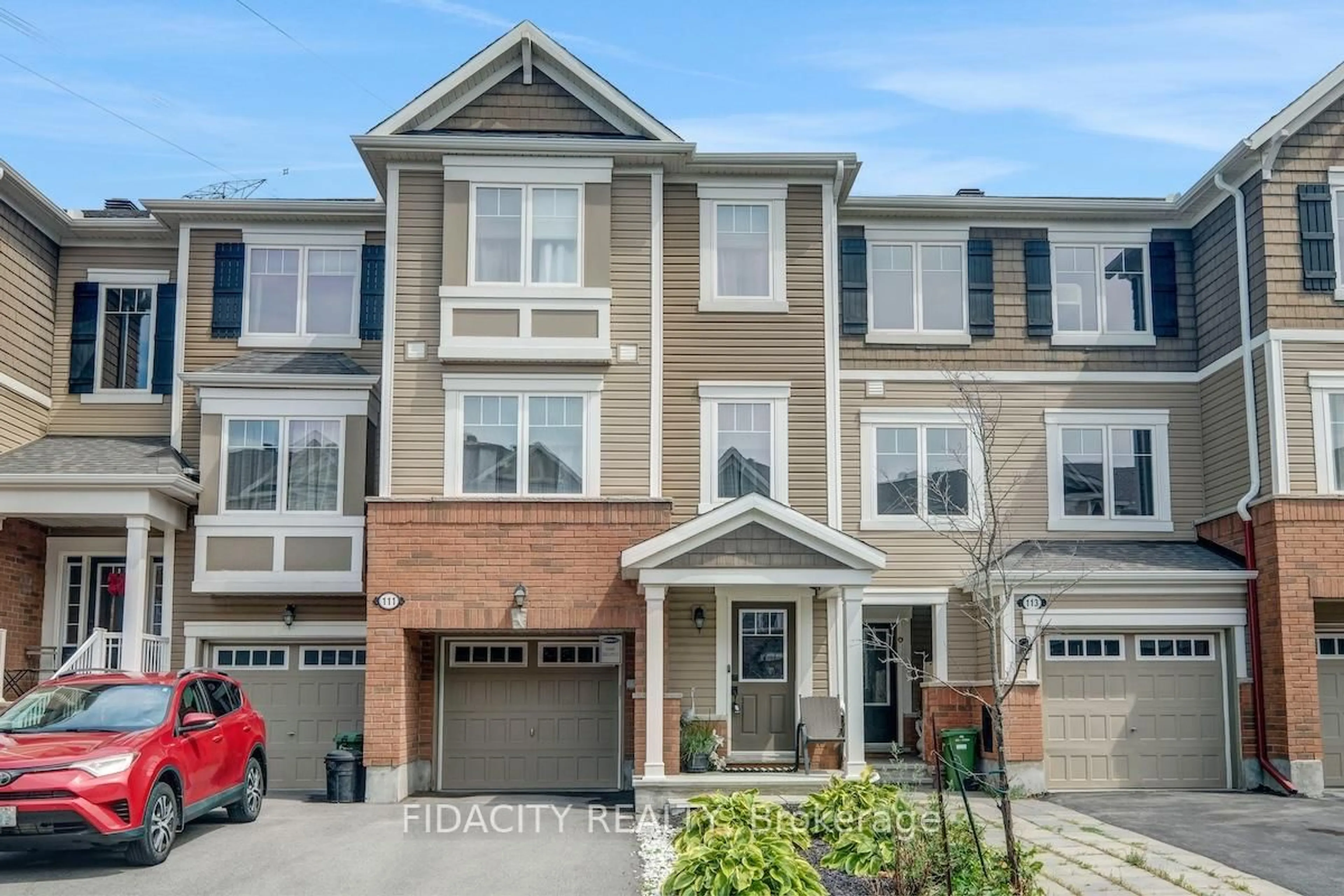 Home with brick exterior material, street for 111 Gelderland Private, Ottawa Ontario K2V 0H8