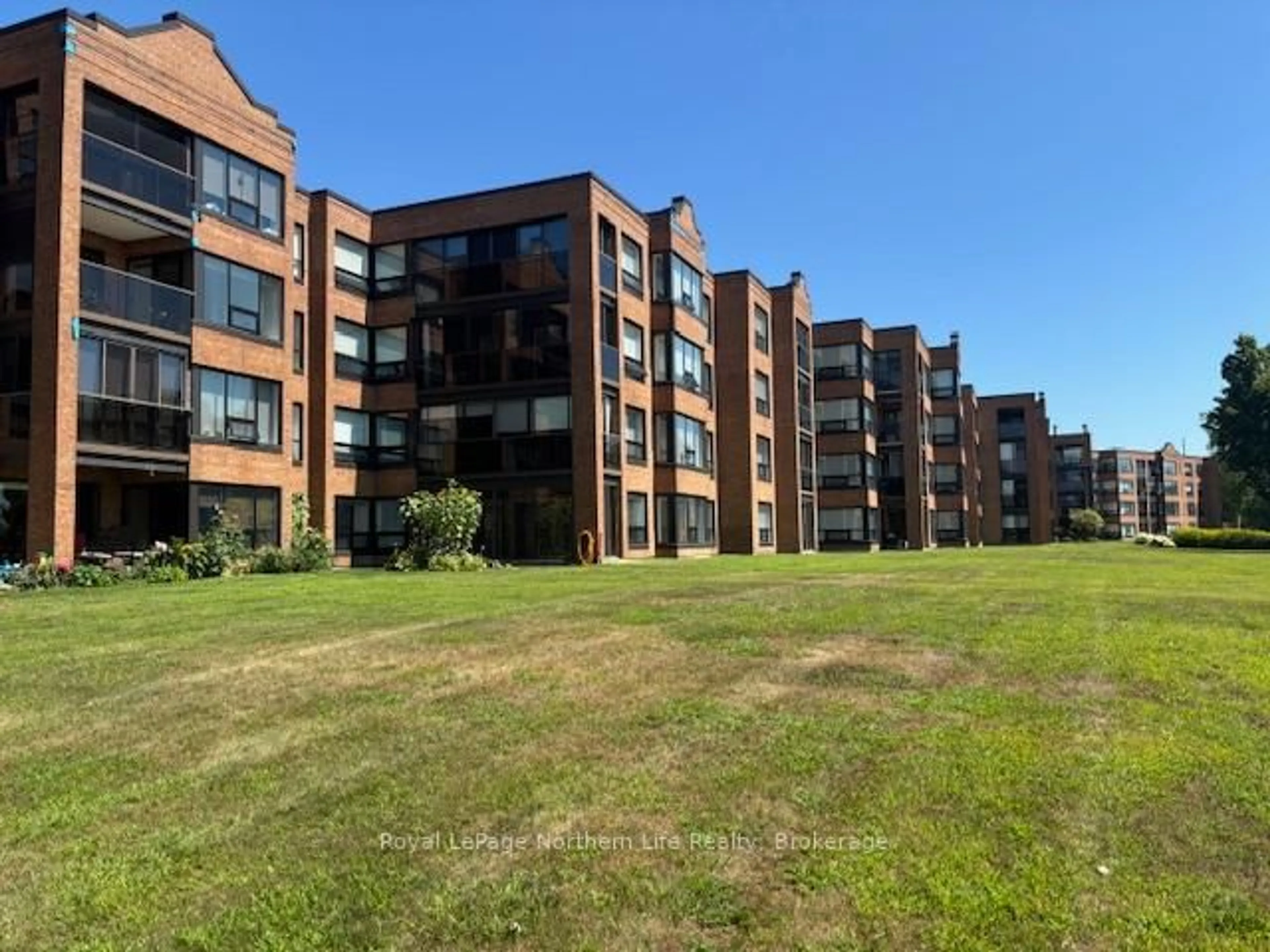 A pic from outside/outdoor area/front of a property/back of a property/a pic from drone, building for 155 Timmins St #114, North Bay Ontario P1B 9K8