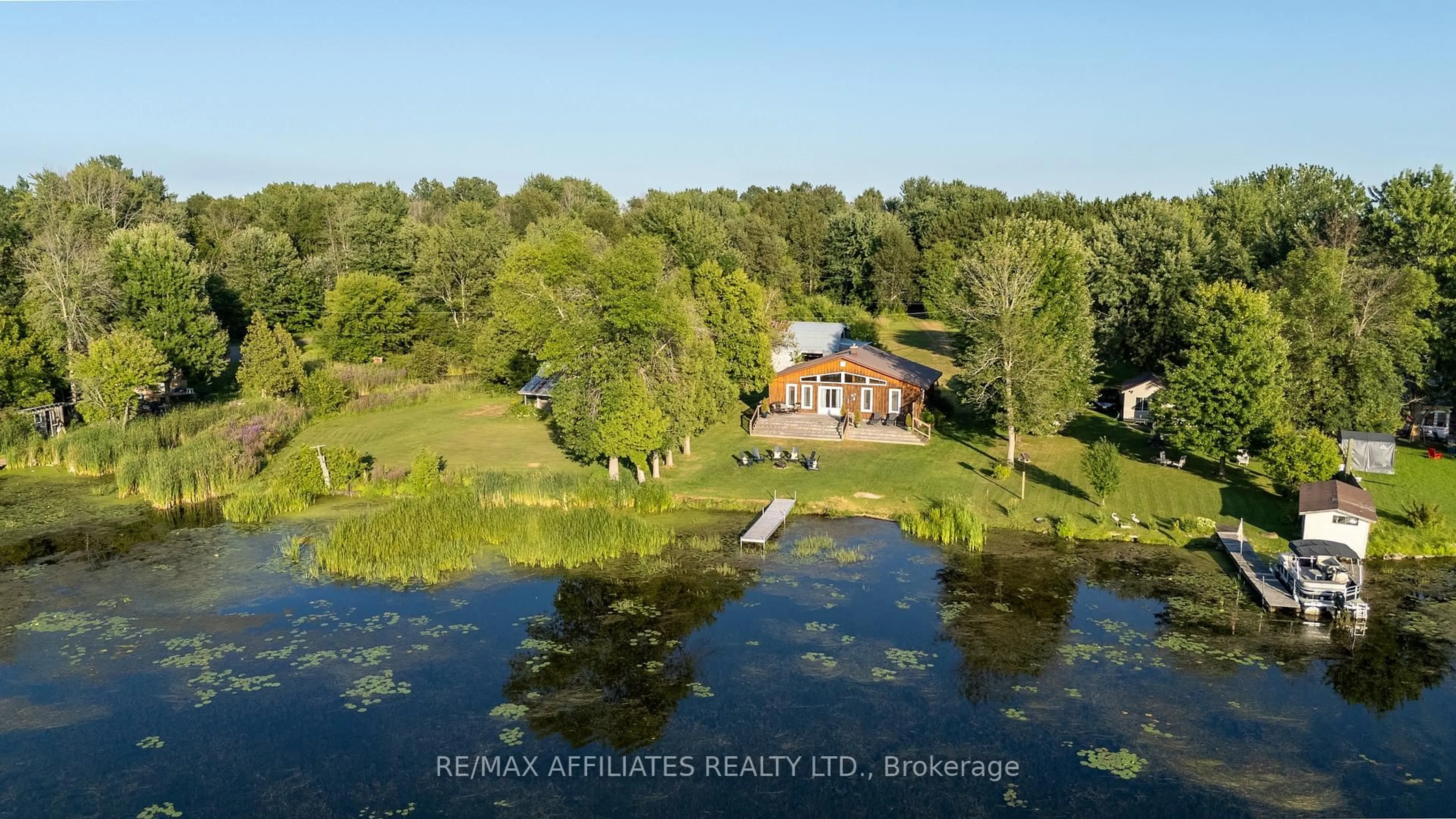 A pic from outside/outdoor area/front of a property/back of a property/a pic from drone, water/lake/river/ocean view for 70 Corktown Lane, Merrickville-Wolford Ontario K0G 1N0