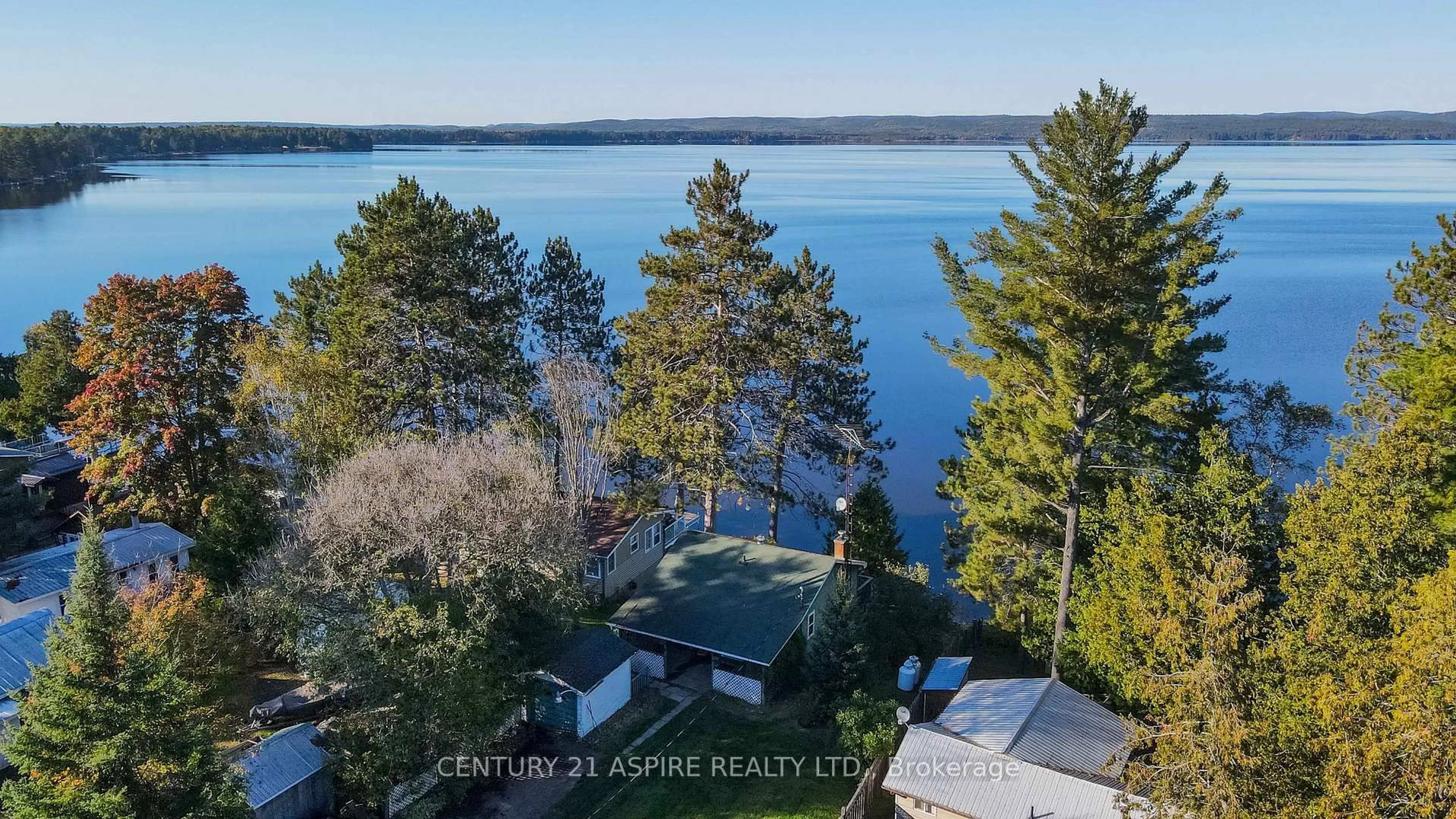 A pic from outside/outdoor area/front of a property/back of a property/a pic from drone, water/lake/river/ocean view for 751 Rock Point Lane, Round Lake Centre Ontario K0J 2J0