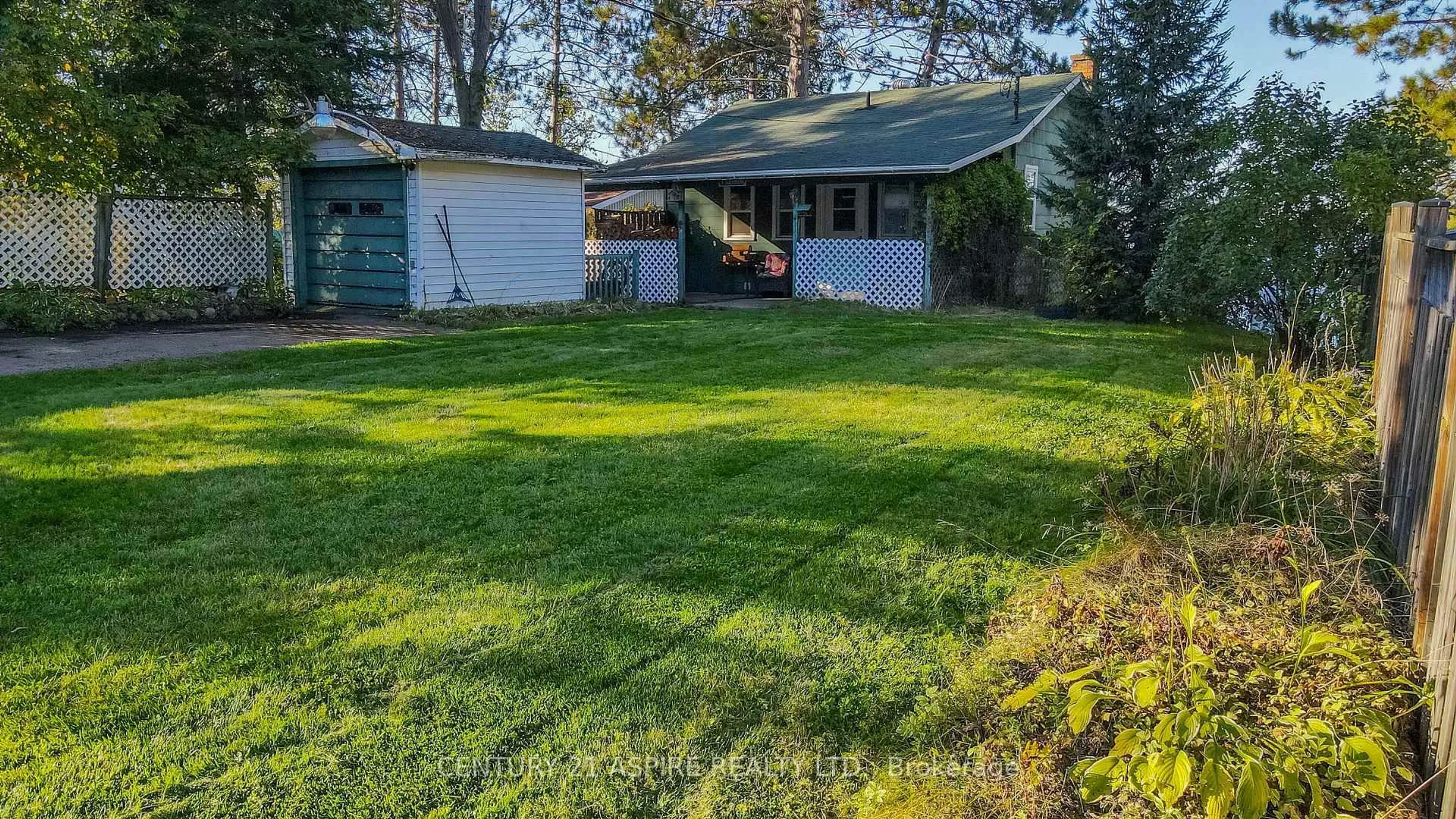 A pic from outside/outdoor area/front of a property/back of a property/a pic from drone, unknown for 751 Rock Point Lane, Round Lake Centre Ontario K0J 2J0