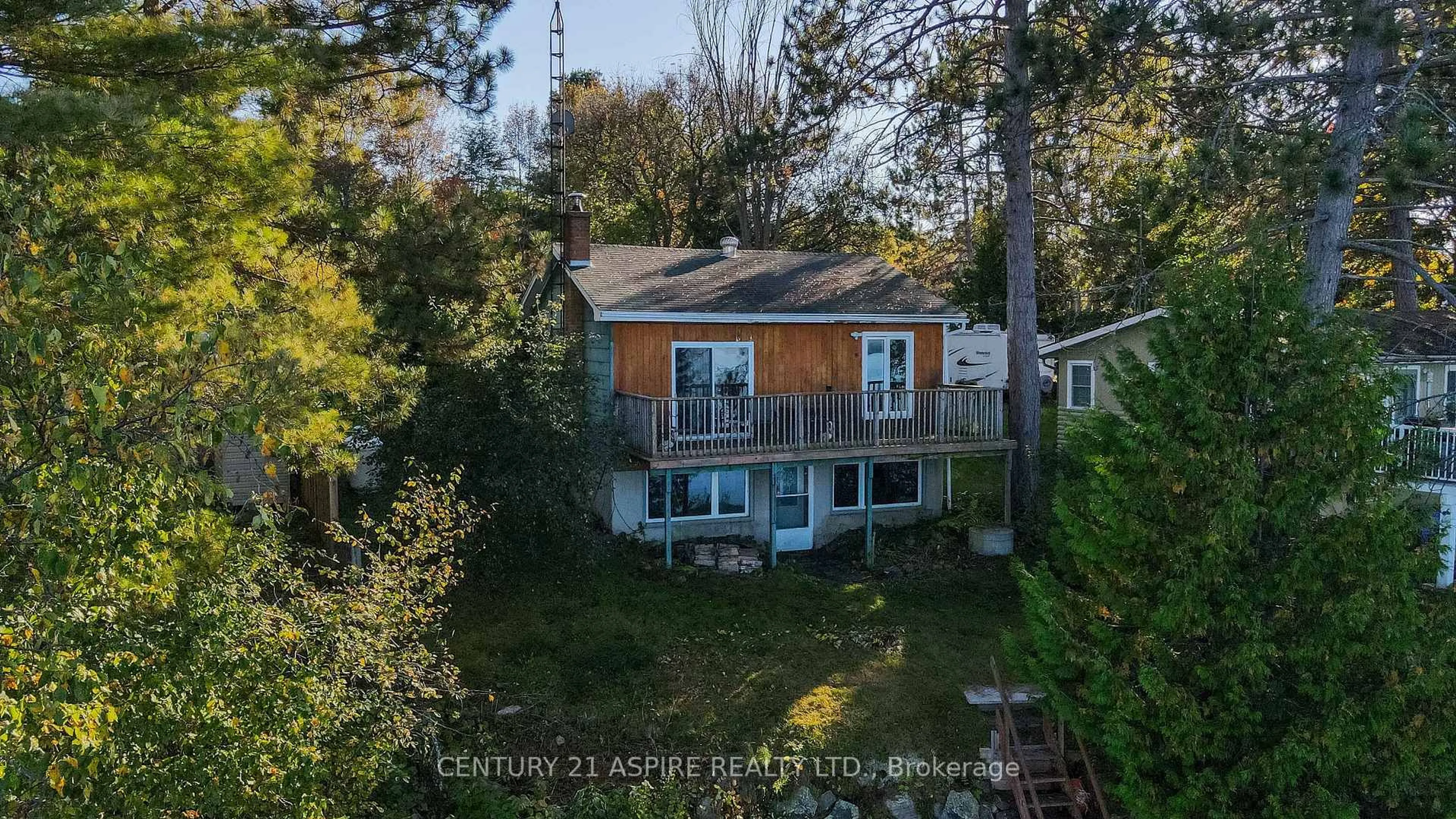A pic from outside/outdoor area/front of a property/back of a property/a pic from drone, water/lake/river/ocean view for 751 Rock Point Lane, Round Lake Centre Ontario K0J 2J0