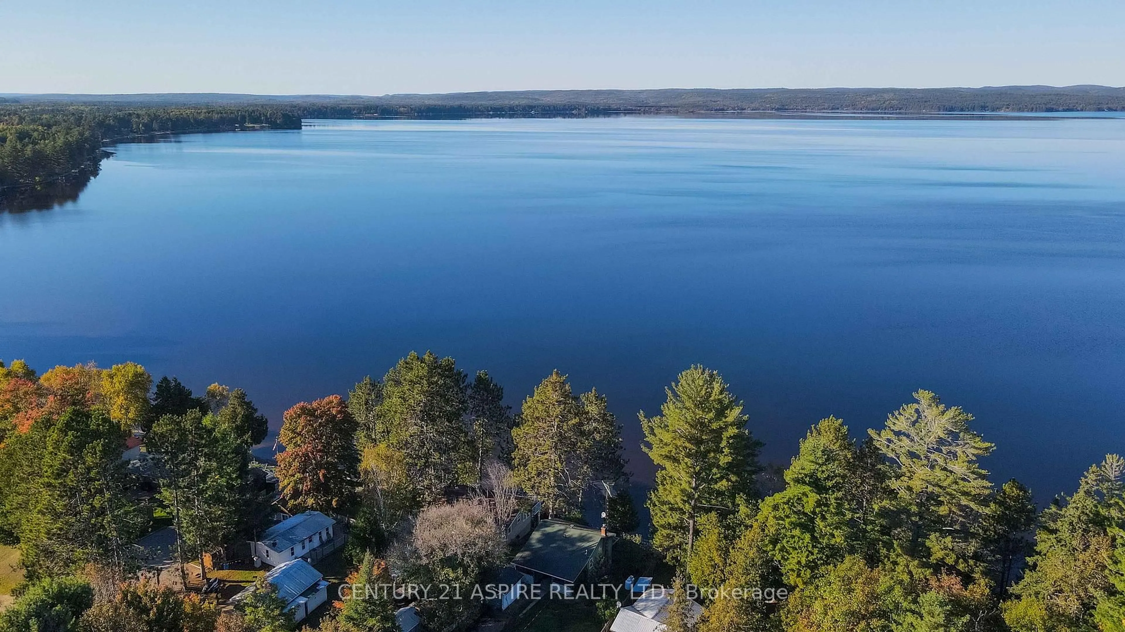 A pic from outside/outdoor area/front of a property/back of a property/a pic from drone, water/lake/river/ocean view for 751 Rock Point Lane, Round Lake Centre Ontario K0J 2J0