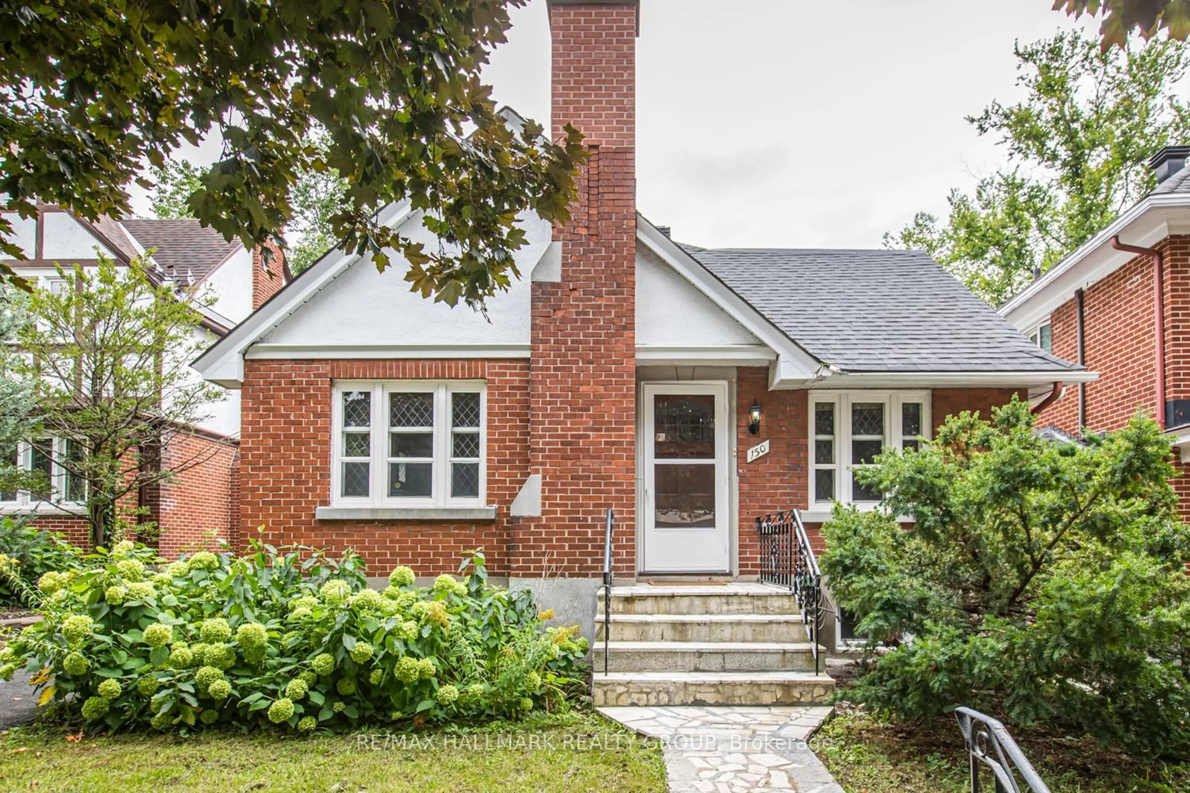 Home with brick exterior material, street for 150 Ruskin St, Ottawa Ontario K1Y 4C1