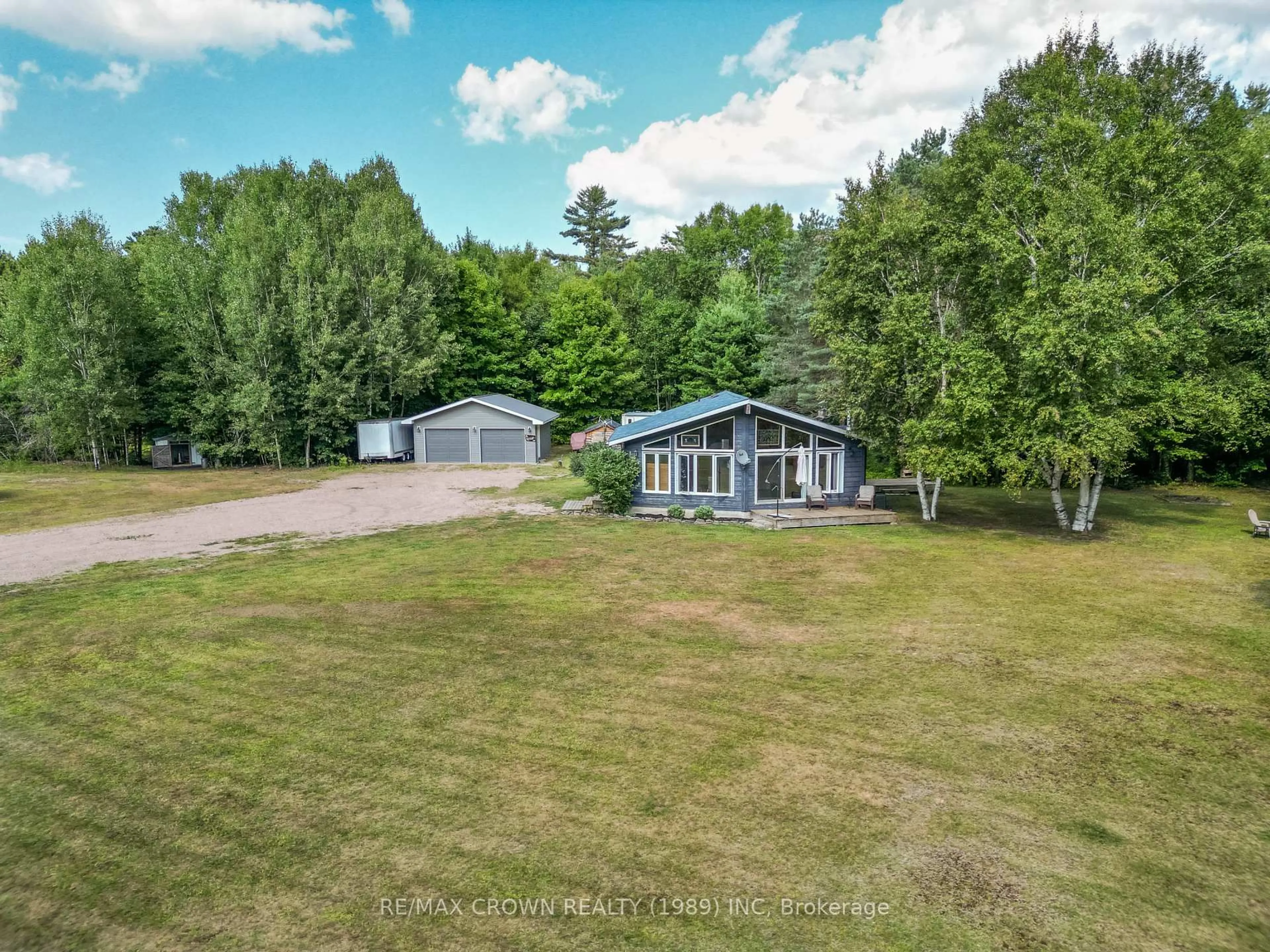 A pic from outside/outdoor area/front of a property/back of a property/a pic from drone, water/lake/river/ocean view for 498 South River Rd, Nipissing Ontario P0H 1W0