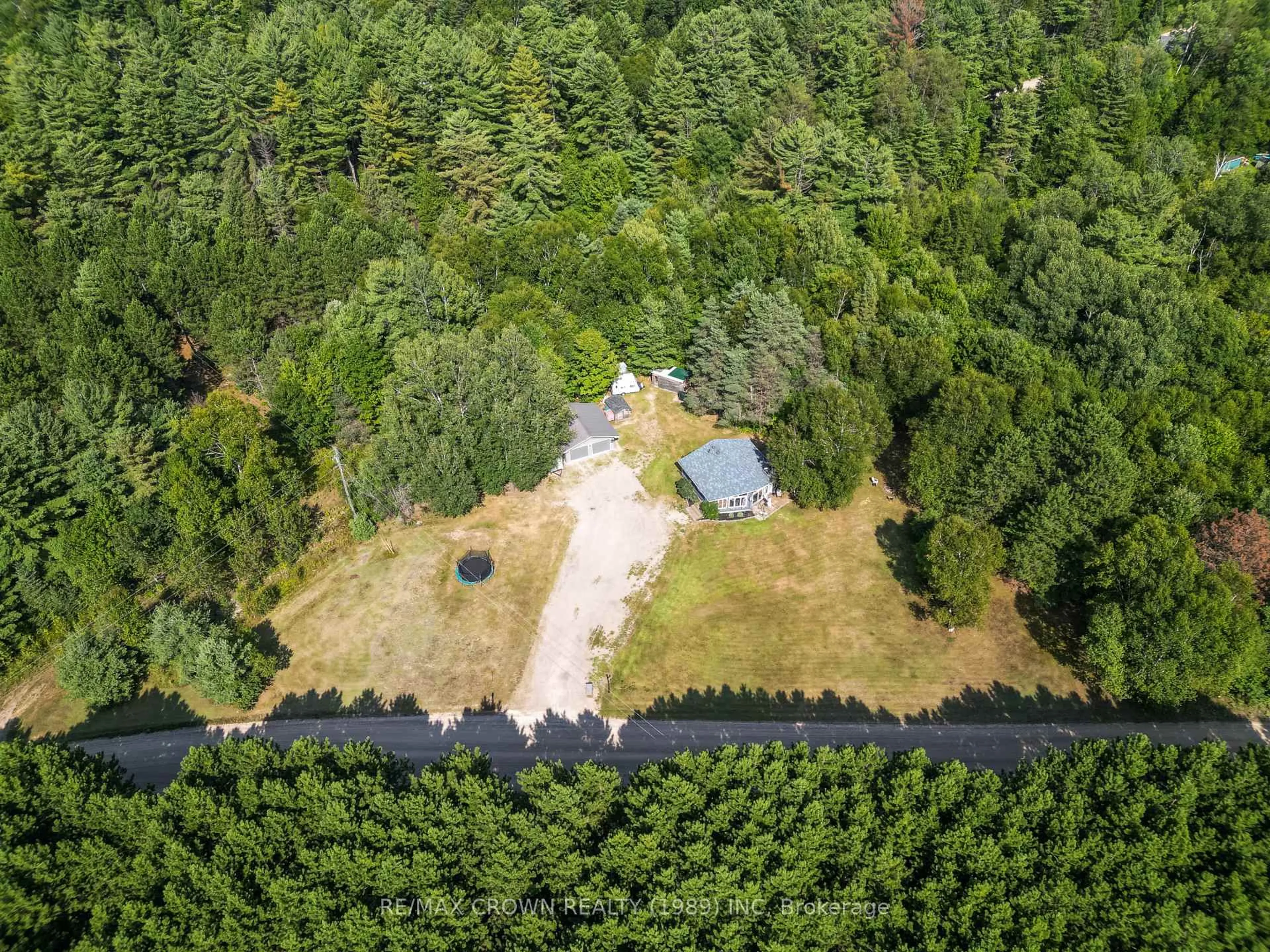 A pic from outside/outdoor area/front of a property/back of a property/a pic from drone, forest/trees view for 498 South River Rd, Nipissing Ontario P0H 1W0