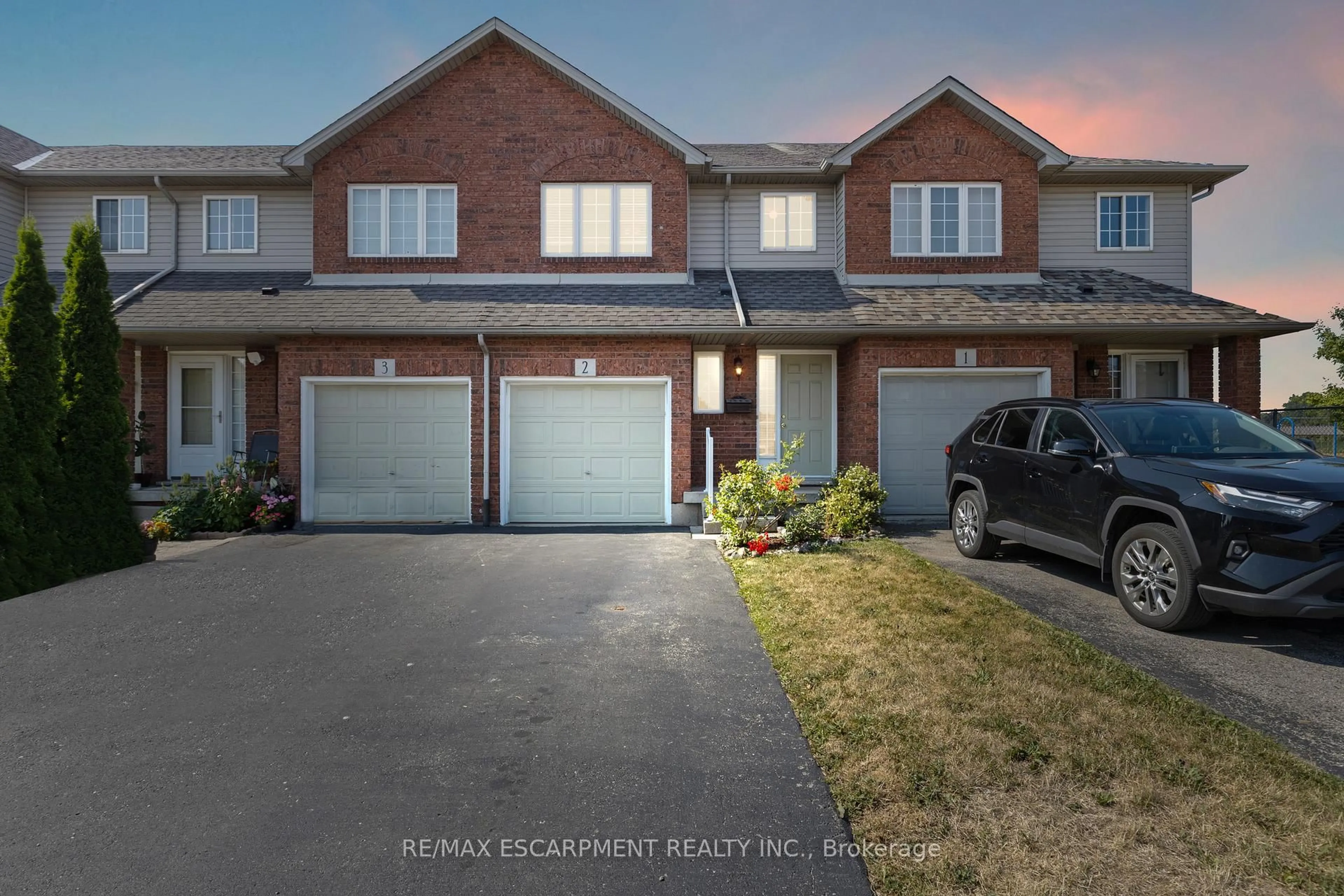 A pic from outside/outdoor area/front of a property/back of a property/a pic from drone, street for 134 TERNI Blvd #2, Hamilton Ontario L8W 3Y9