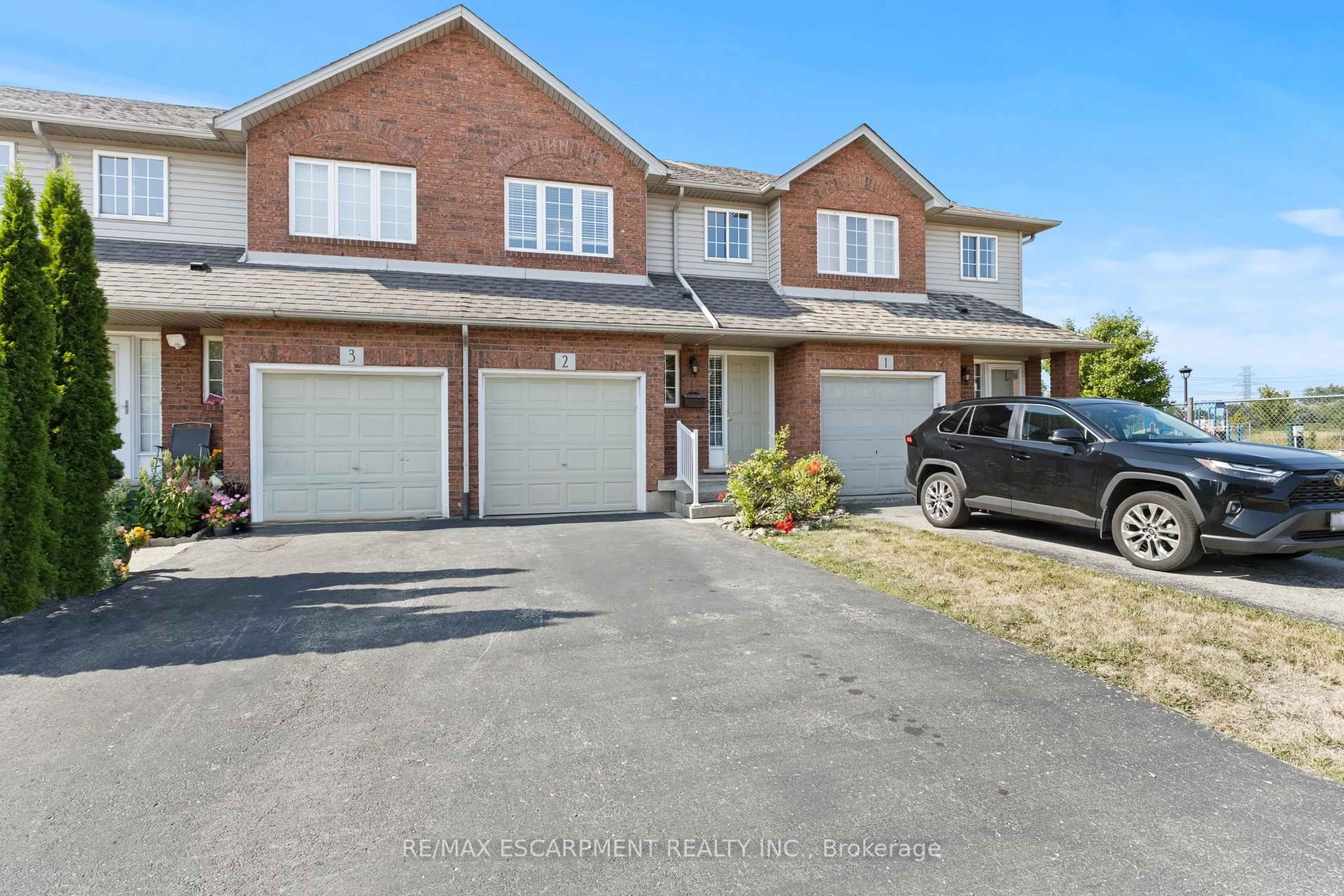 A pic from outside/outdoor area/front of a property/back of a property/a pic from drone, street for 134 TERNI Blvd #2, Hamilton Ontario L8W 3Y9