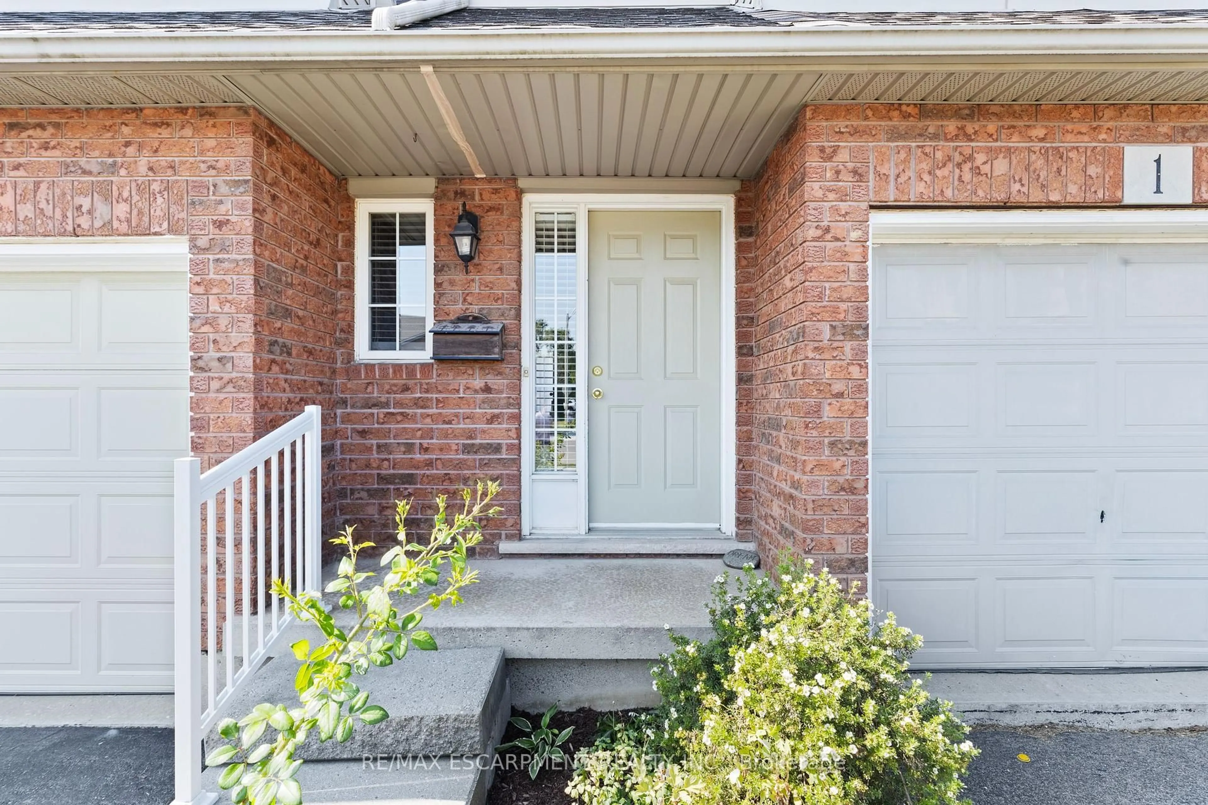 Home with brick exterior material, street for 134 TERNI Blvd #2, Hamilton Ontario L8W 3Y9