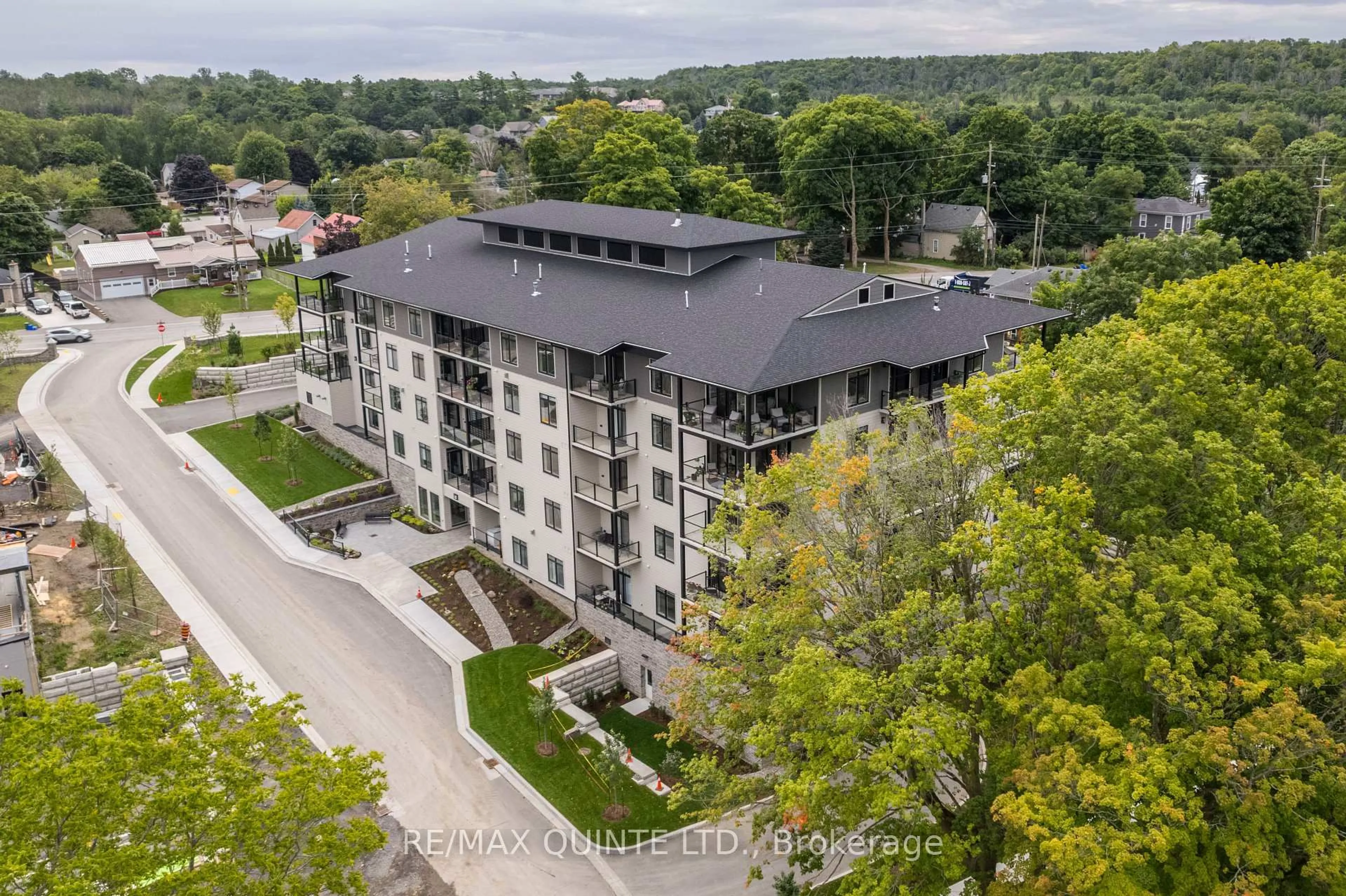 A pic from outside/outdoor area/front of a property/back of a property/a pic from drone, city buildings view from balcony for 17 Cleave Ave #407, Prince Edward County Ontario K0K 2T0
