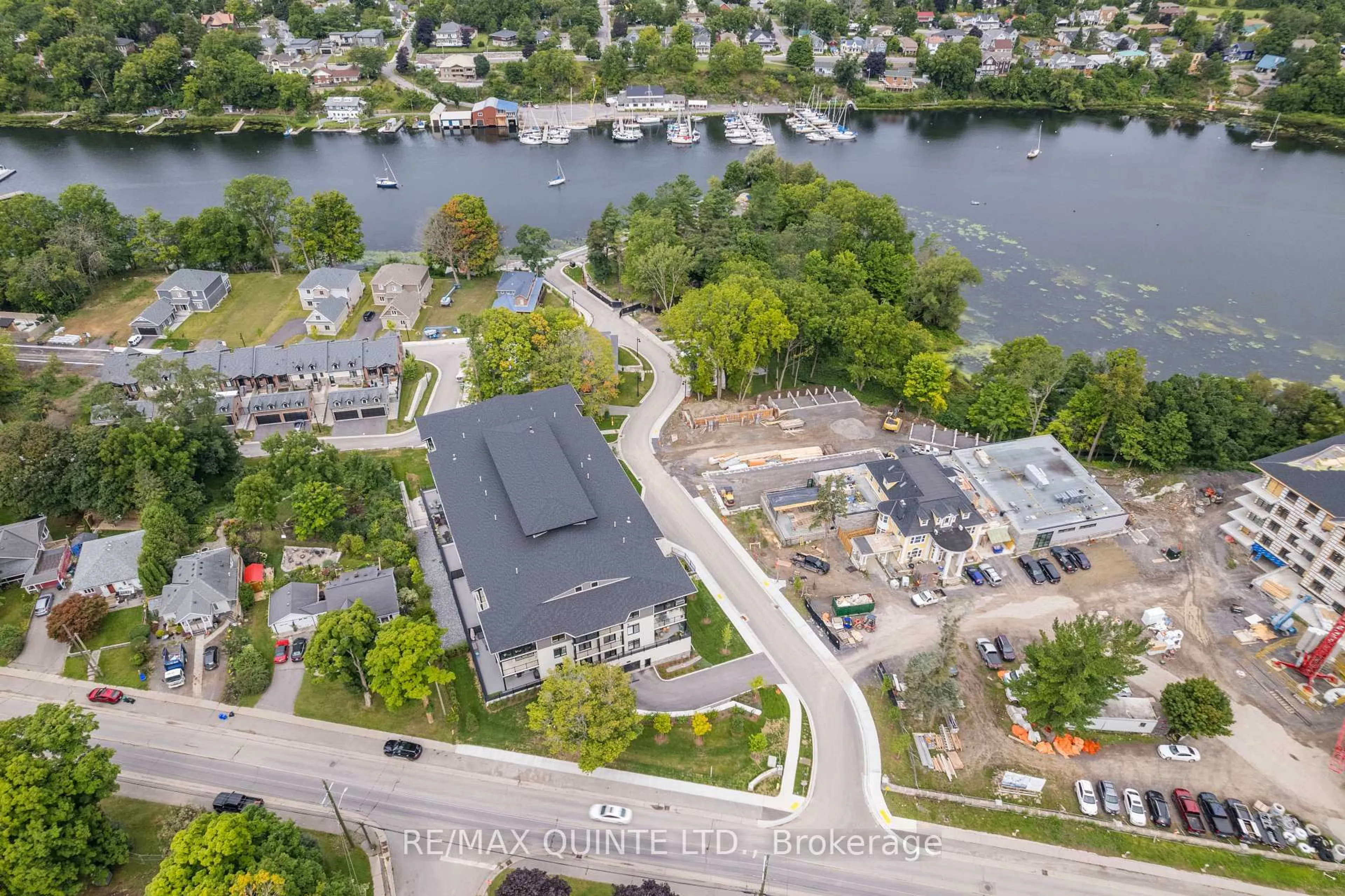 A pic from outside/outdoor area/front of a property/back of a property/a pic from drone, water/lake/river/ocean view for 17 Cleave Ave #407, Prince Edward County Ontario K0K 2T0