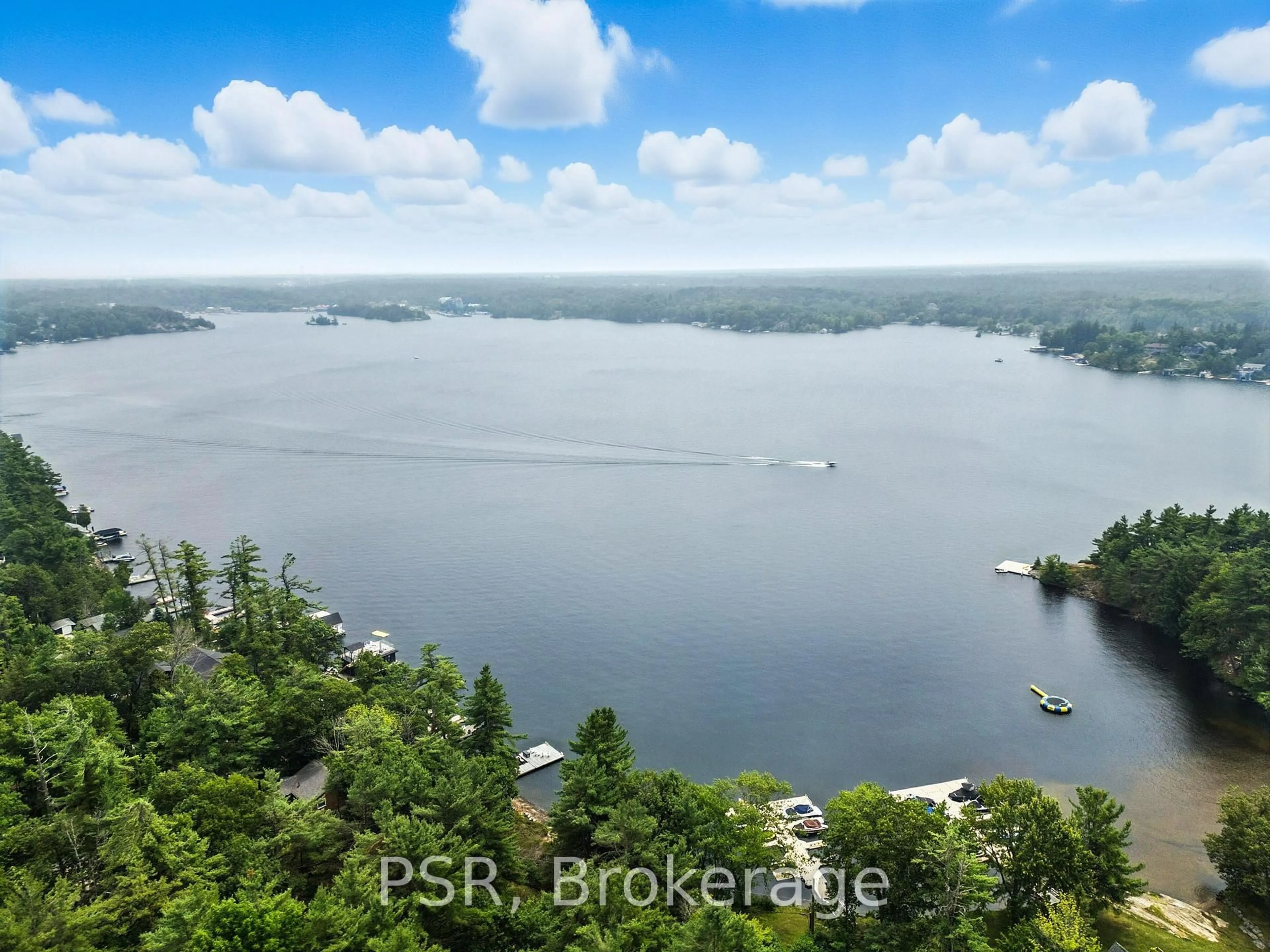 A pic from outside/outdoor area/front of a property/back of a property/a pic from drone, water/lake/river/ocean view for 1166 Parkers Point Rd, Gravenhurst Ontario P1P 1R2