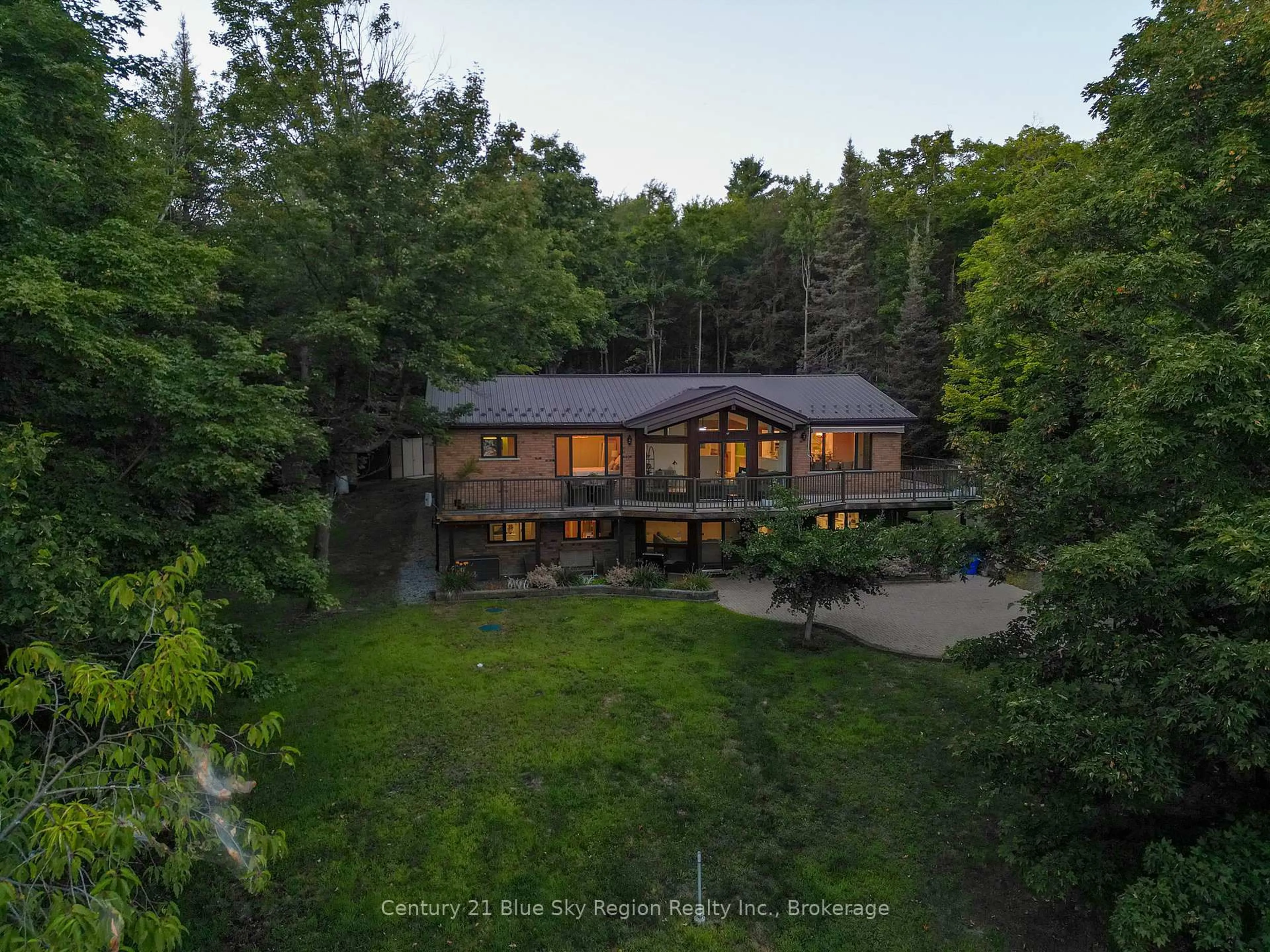 A pic from outside/outdoor area/front of a property/back of a property/a pic from drone, forest/trees view for 708 Anita Ave, North Bay Ontario P1B 8G4