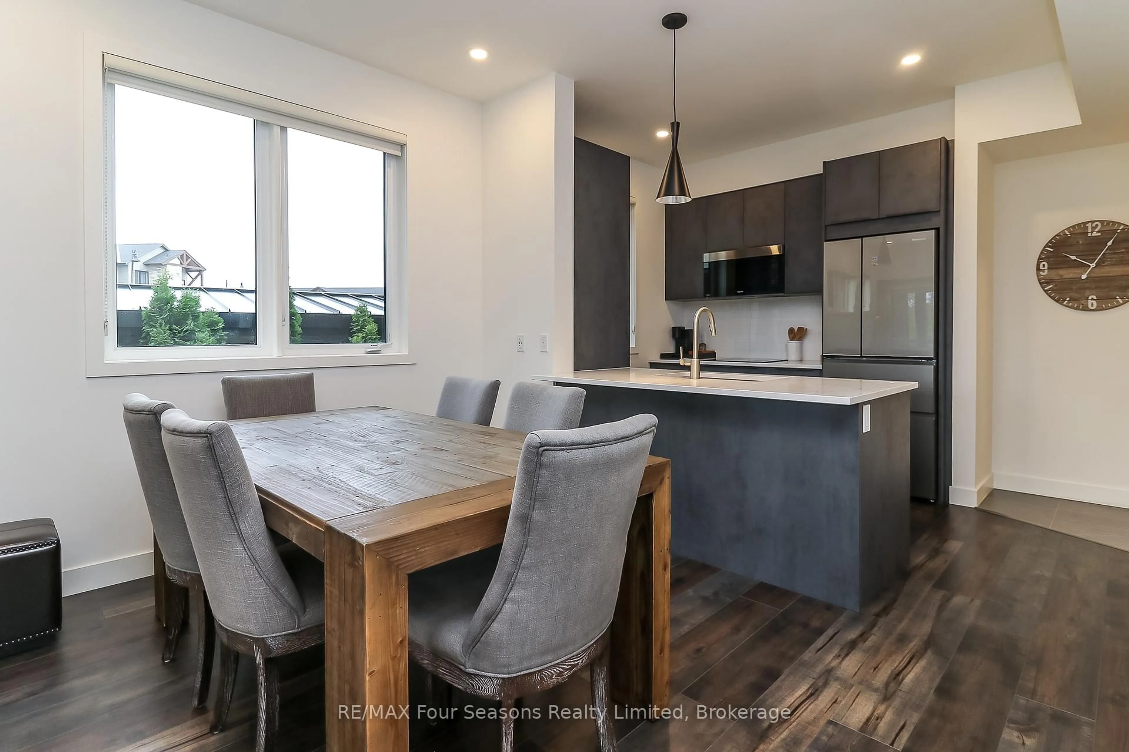 Open concept kitchen, wood/laminate floor for 12 BEAUSOLEIL Lane #107, Blue Mountains Ontario L9Y 2X5