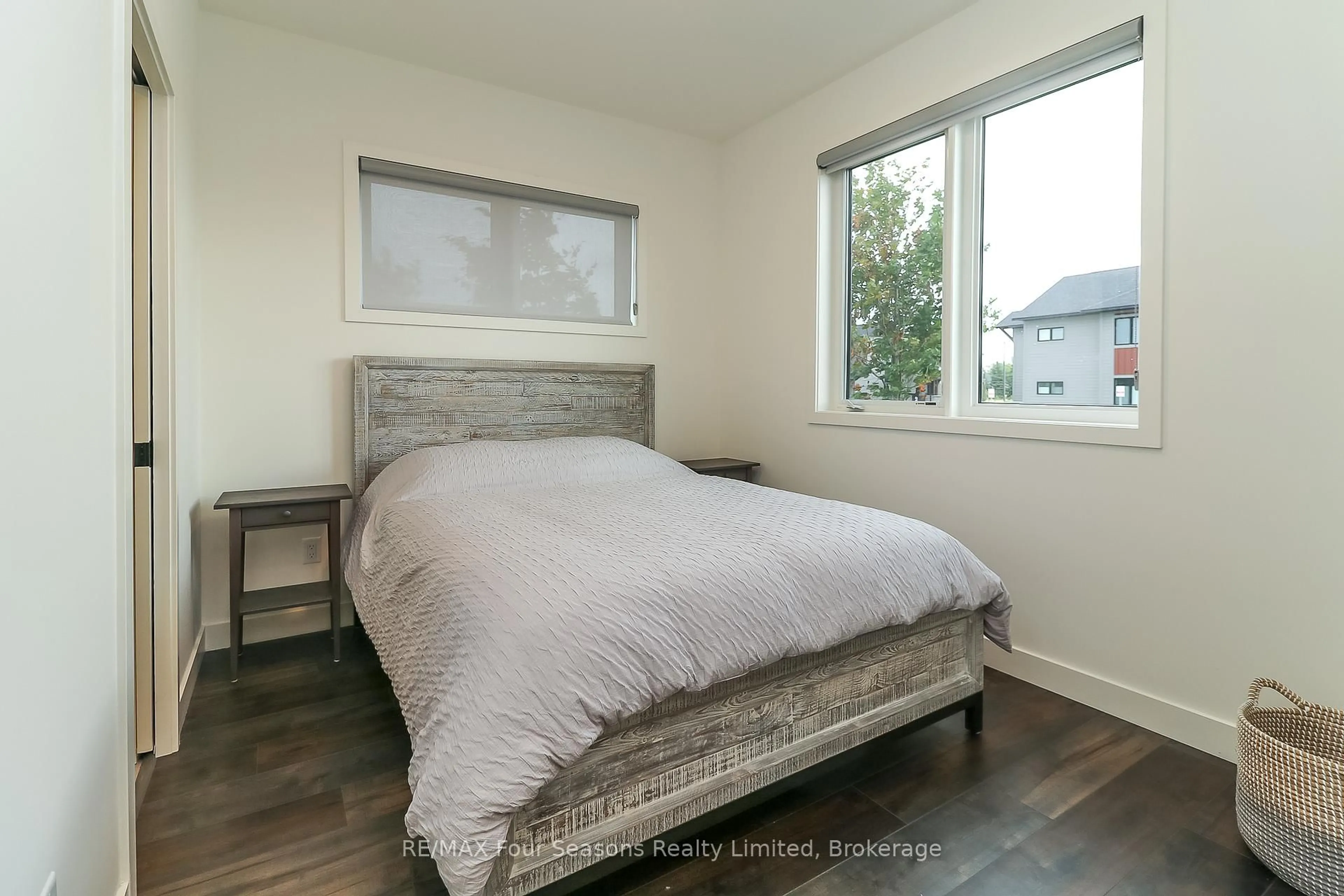 Bedroom with bed, wood/laminate floor for 12 BEAUSOLEIL Lane #107, Blue Mountains Ontario L9Y 2X5