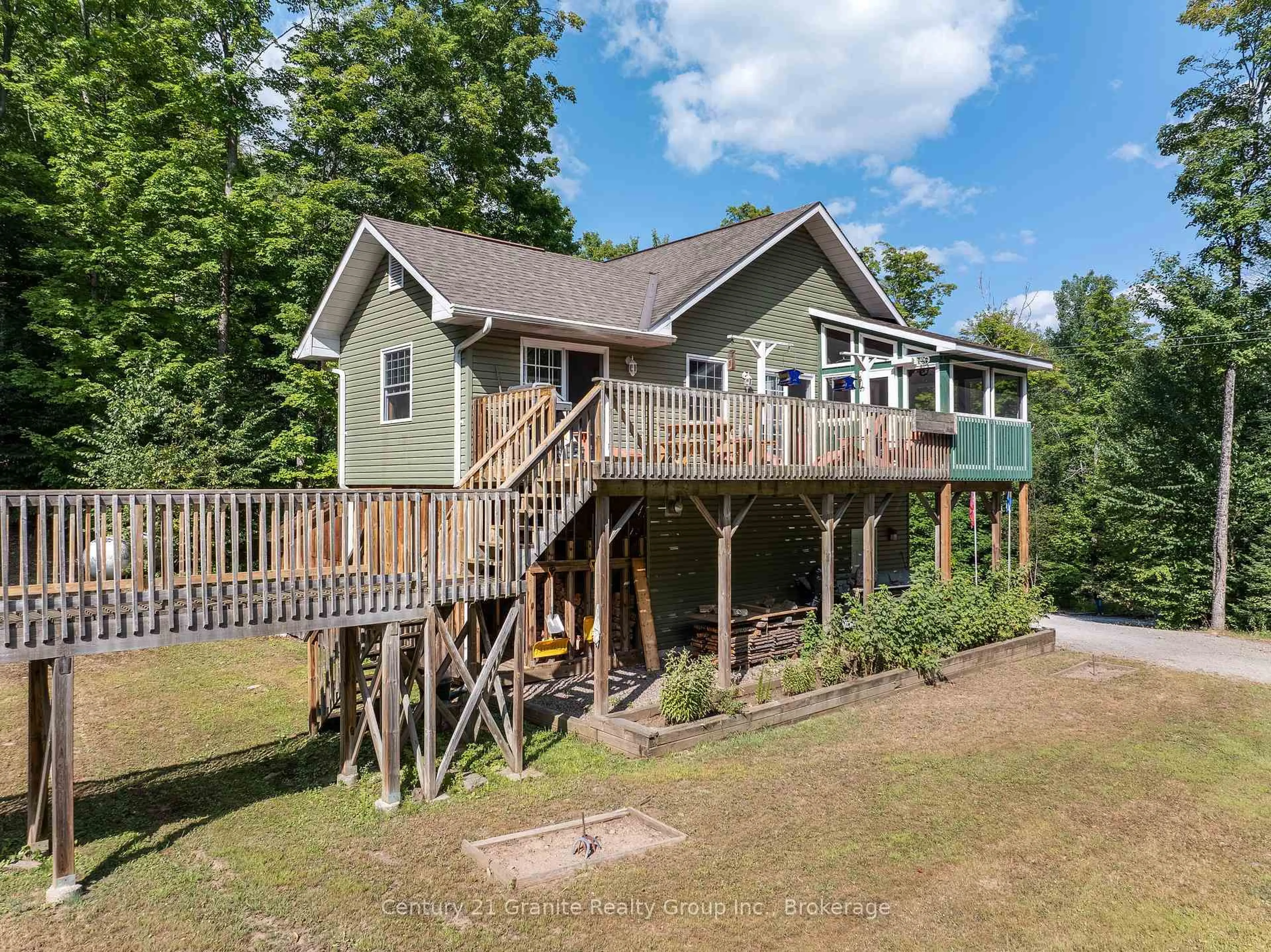 A pic from outside/outdoor area/front of a property/back of a property/a pic from drone, water/lake/river/ocean view for 1071 Dardanelles Rd, Dysart et al Ontario K0M 1S0