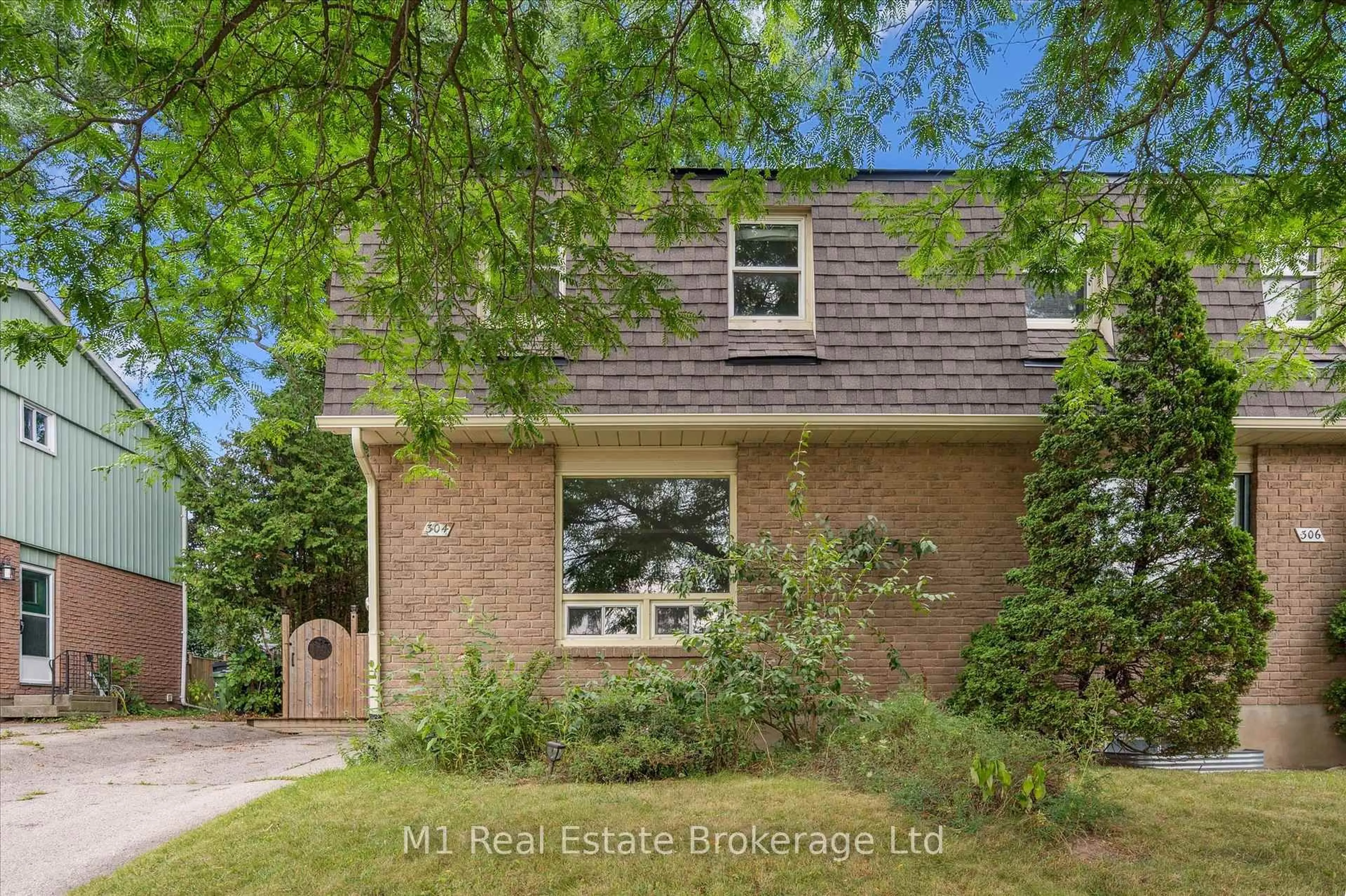 Home with brick exterior material, street for 304 Cole Rd, Guelph Ontario N1G 3J2