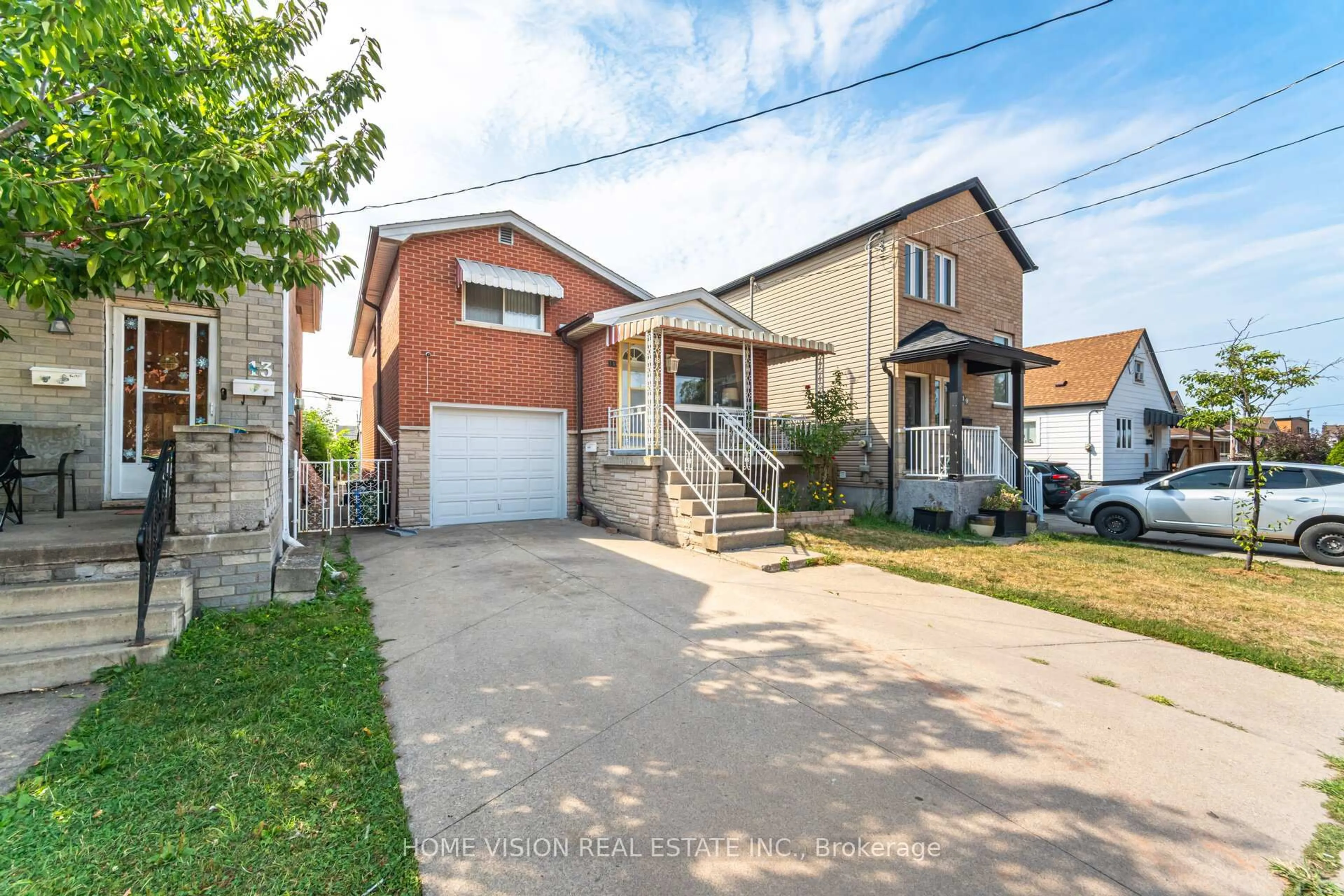 Home with brick exterior material, street for 15 Adair Ave, Hamilton Ontario L8H 6A5