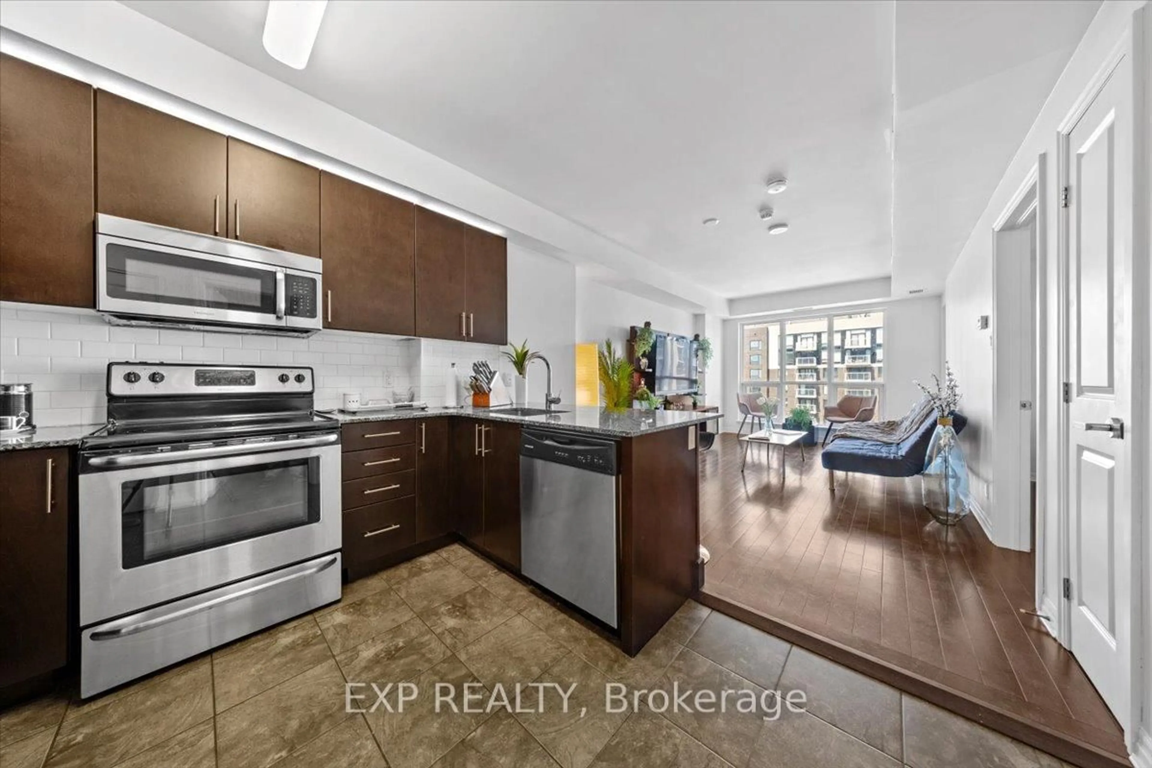Open concept kitchen, ceramic/tile floor for 242 Rideau St #2505, Ottawa Ontario K1N 0B7