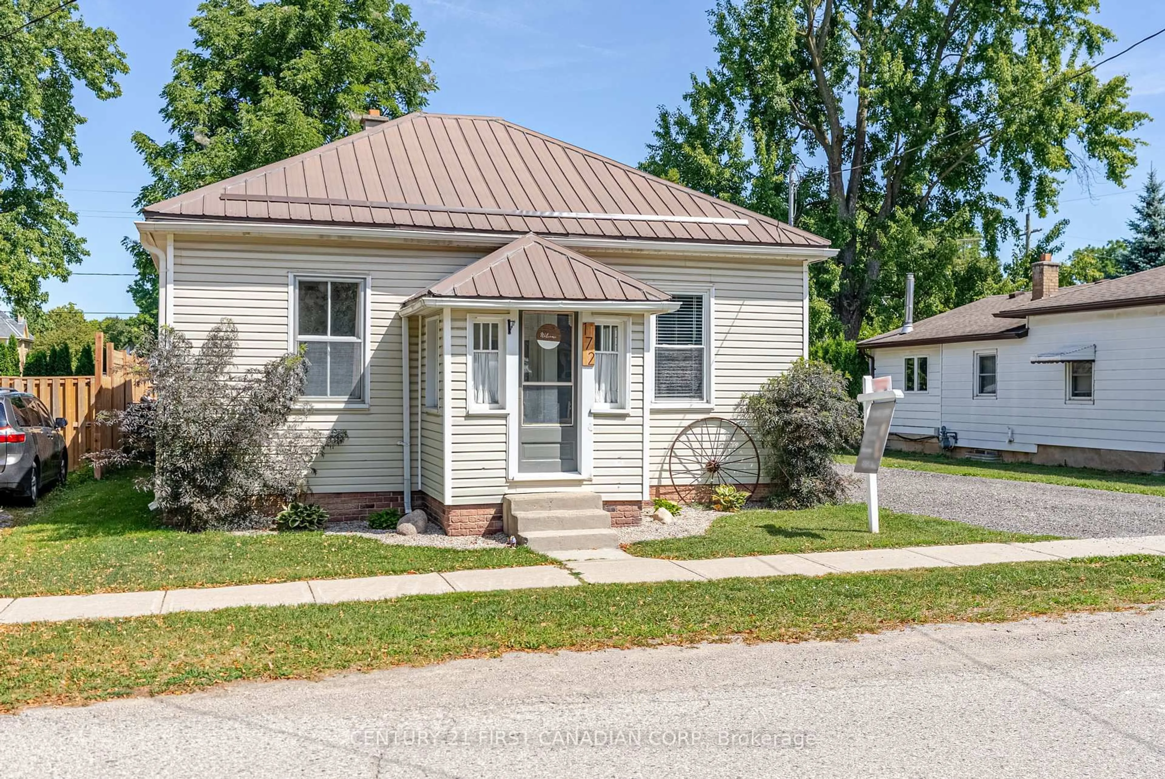 Home with vinyl exterior material, street for 172 George St, North Middlesex Ontario N0M 1A0