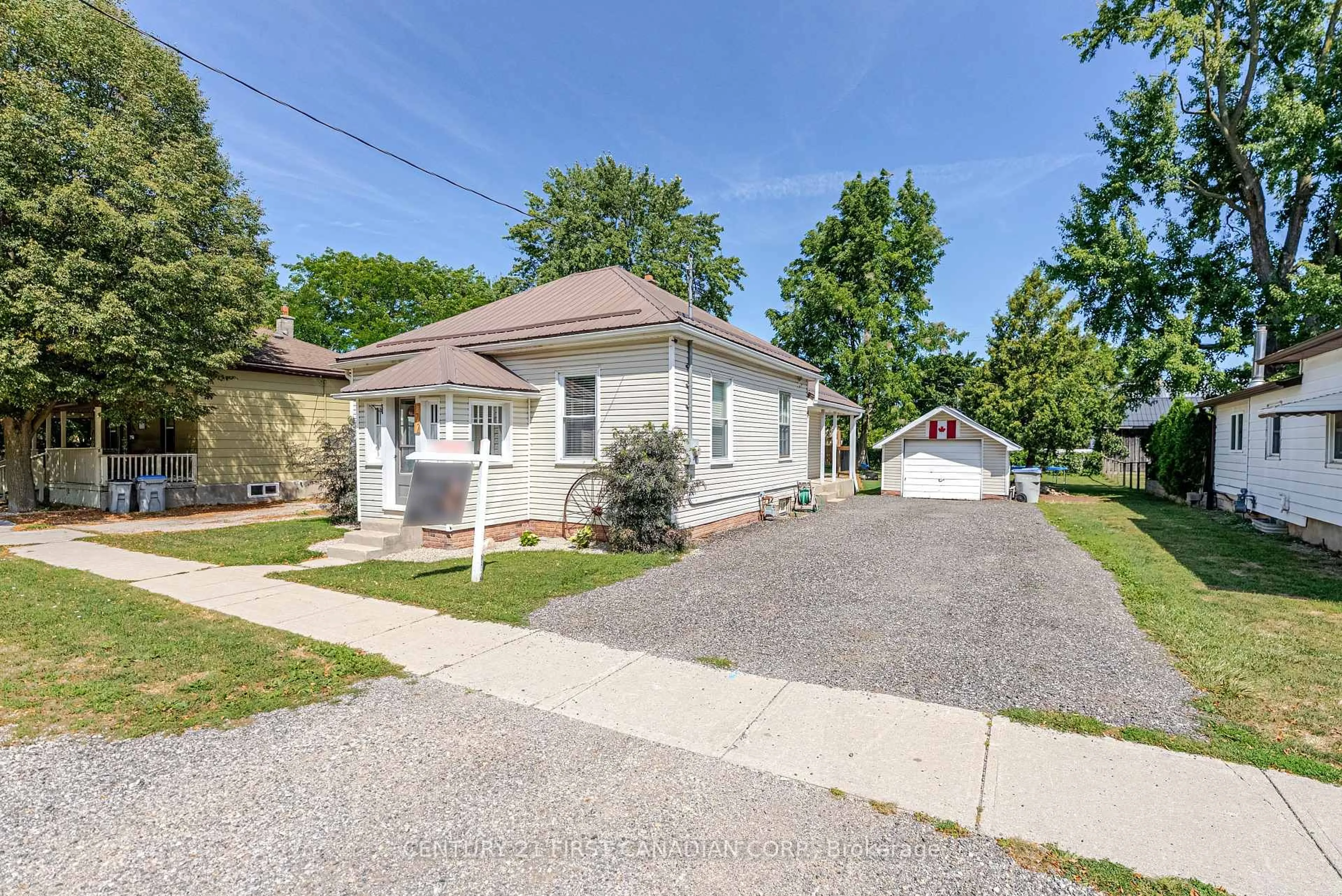 A pic from outside/outdoor area/front of a property/back of a property/a pic from drone, street for 172 George St, North Middlesex Ontario N0M 1A0