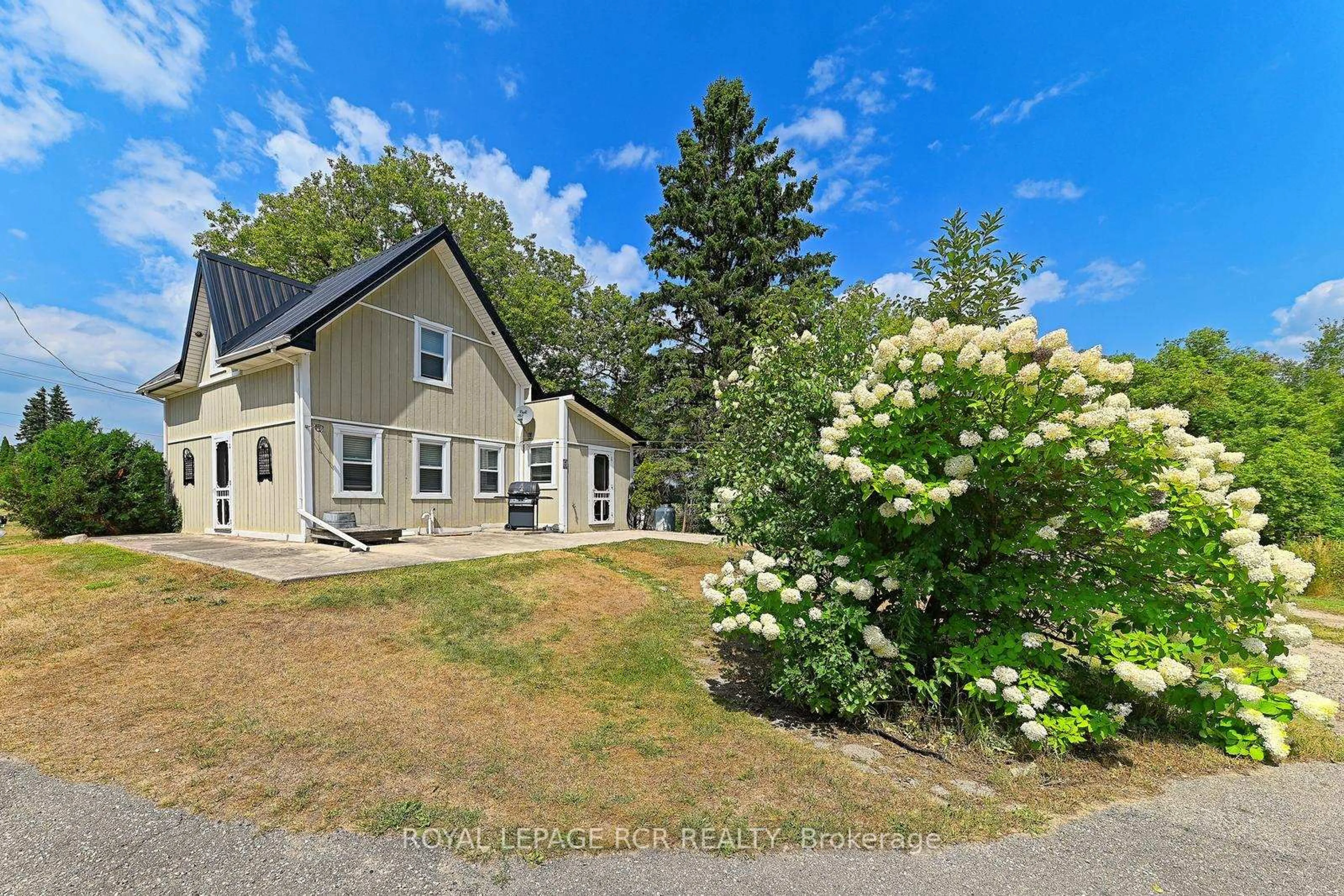 A pic from outside/outdoor area/front of a property/back of a property/a pic from drone, unknown for 62008 County Road 3, East Garafraxa Ontario L9W 7H7