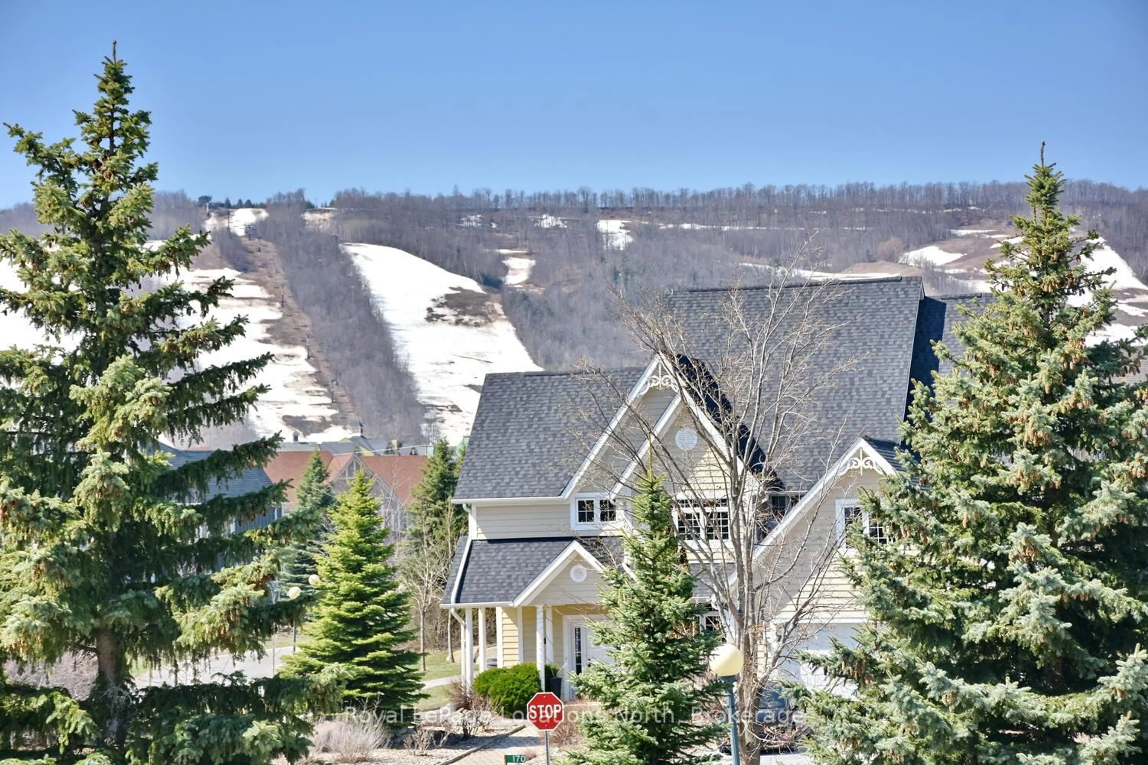 A pic from outside/outdoor area/front of a property/back of a property/a pic from drone, mountain view for 170 Snowbridge Way #223, Blue Mountains Ontario L9Y 0V2