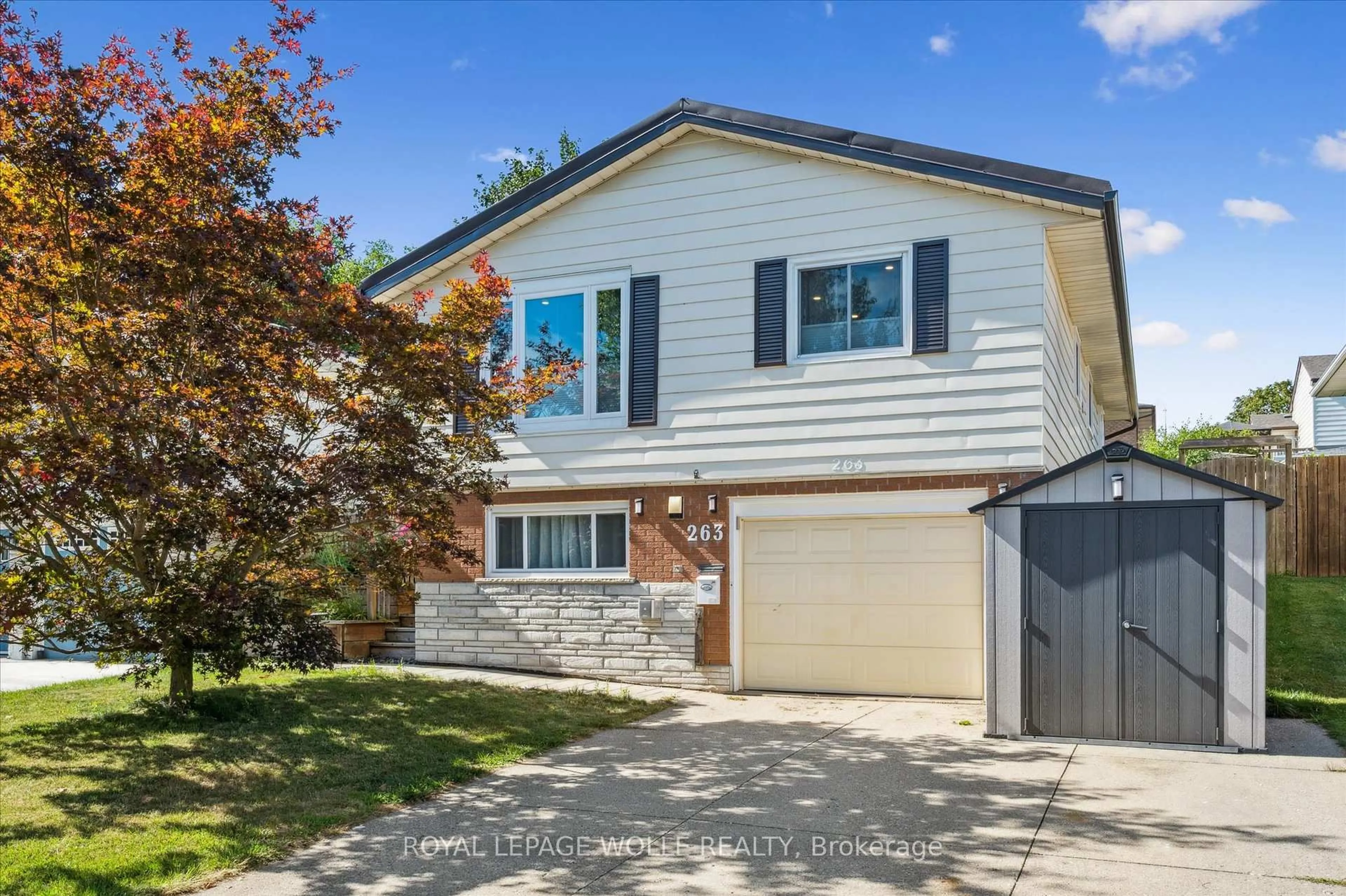 Home with vinyl exterior material, street for 263 The Country Way, Kitchener Ontario N2E 2V6