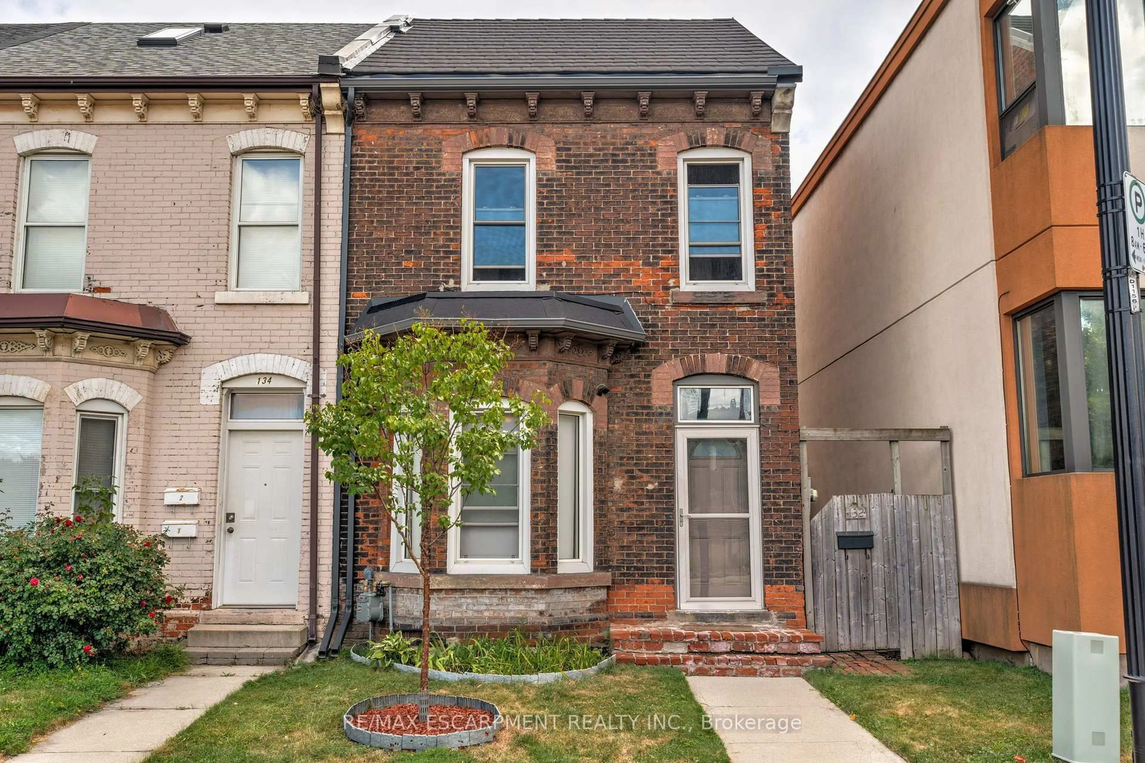 Home with brick exterior material, street for 132 Ferguson Ave, Hamilton Ontario L8R 1L7