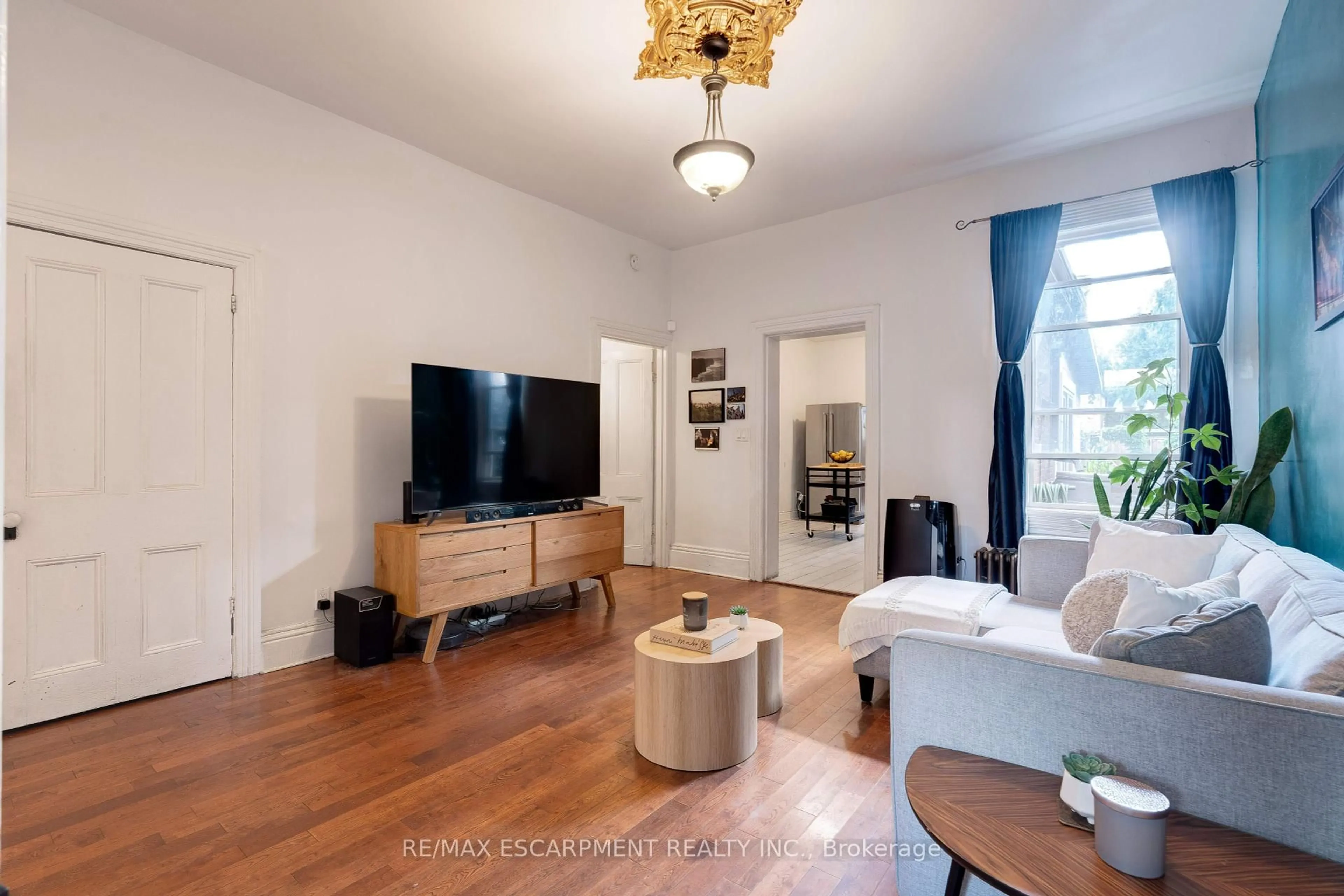Living room with furniture, unknown for 132 Ferguson Ave, Hamilton Ontario L8R 1L7
