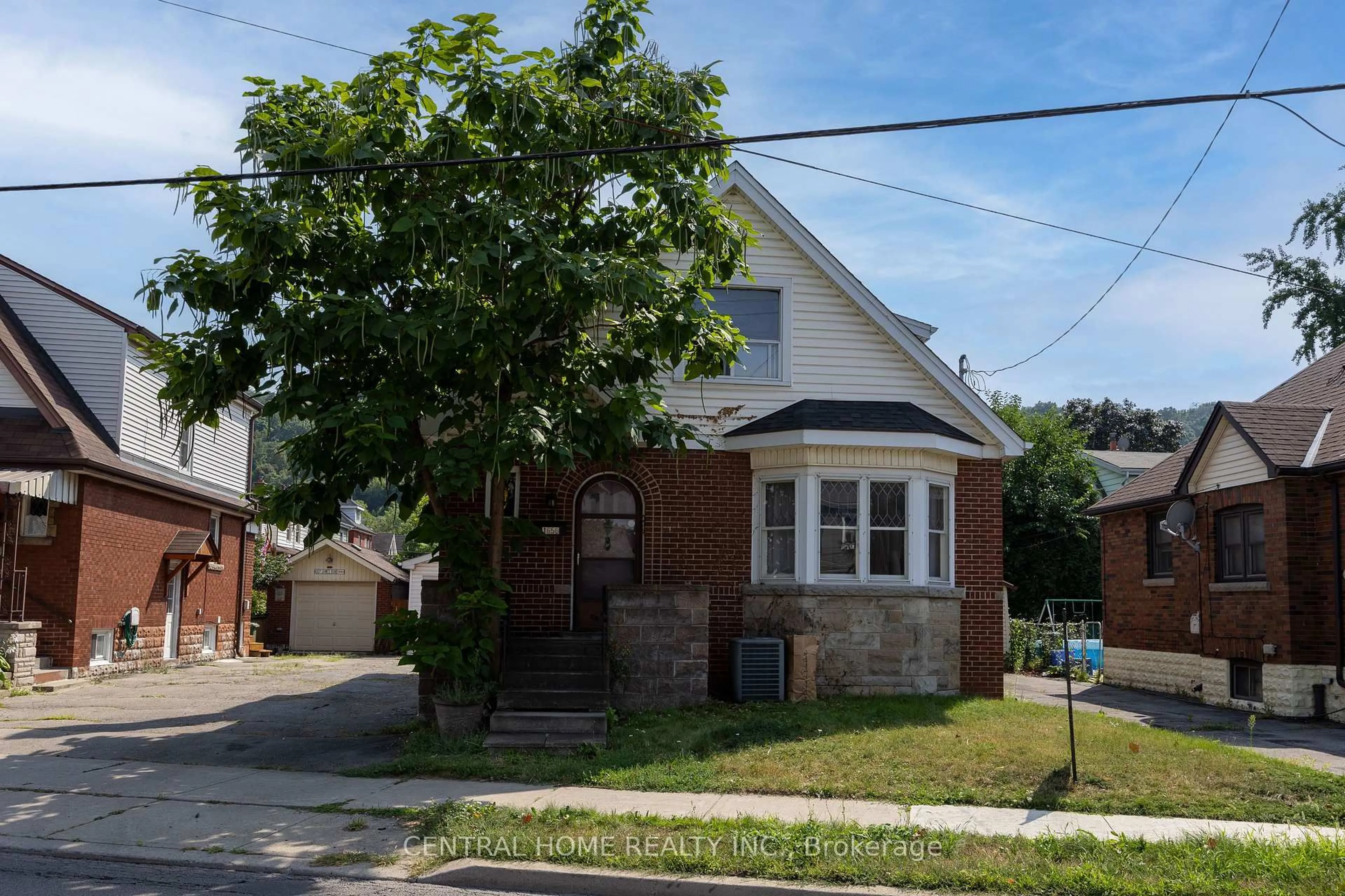 Home with brick exterior material, street for 1650 King St, Hamilton Ontario L8K 1T9
