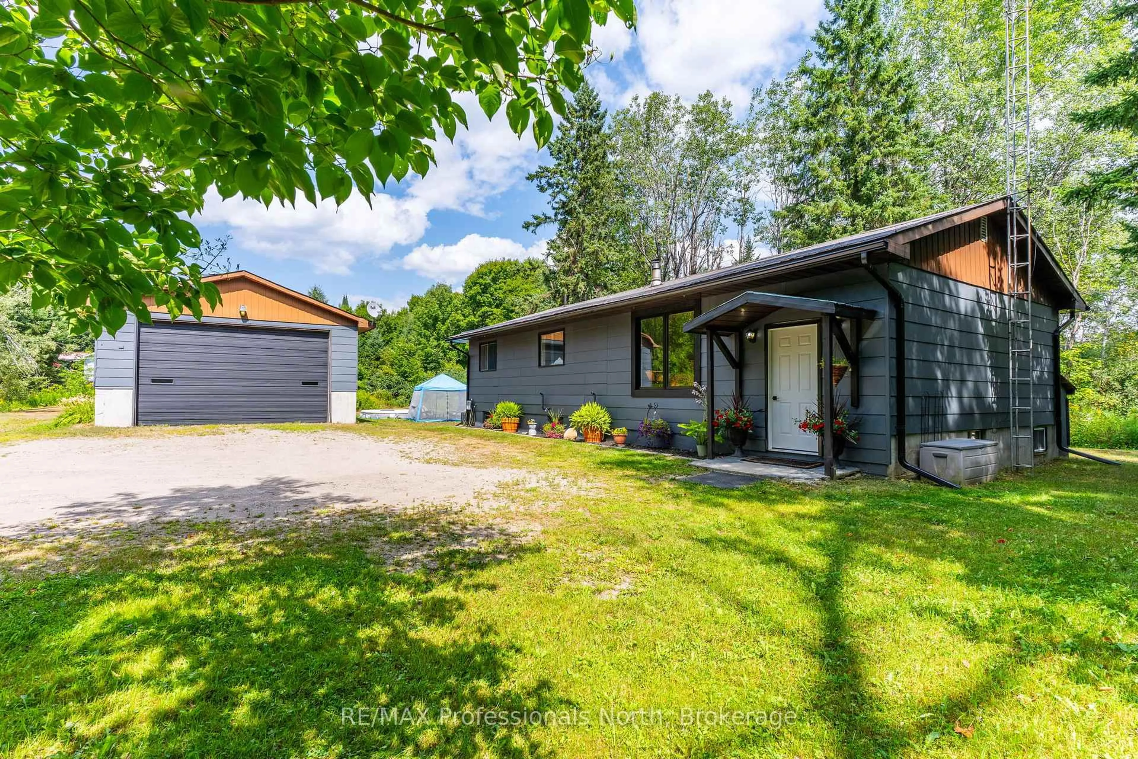 A pic from outside/outdoor area/front of a property/back of a property/a pic from drone, street for 3866 Deep Bay Rd, Minden Hills Ontario K0M 2K0