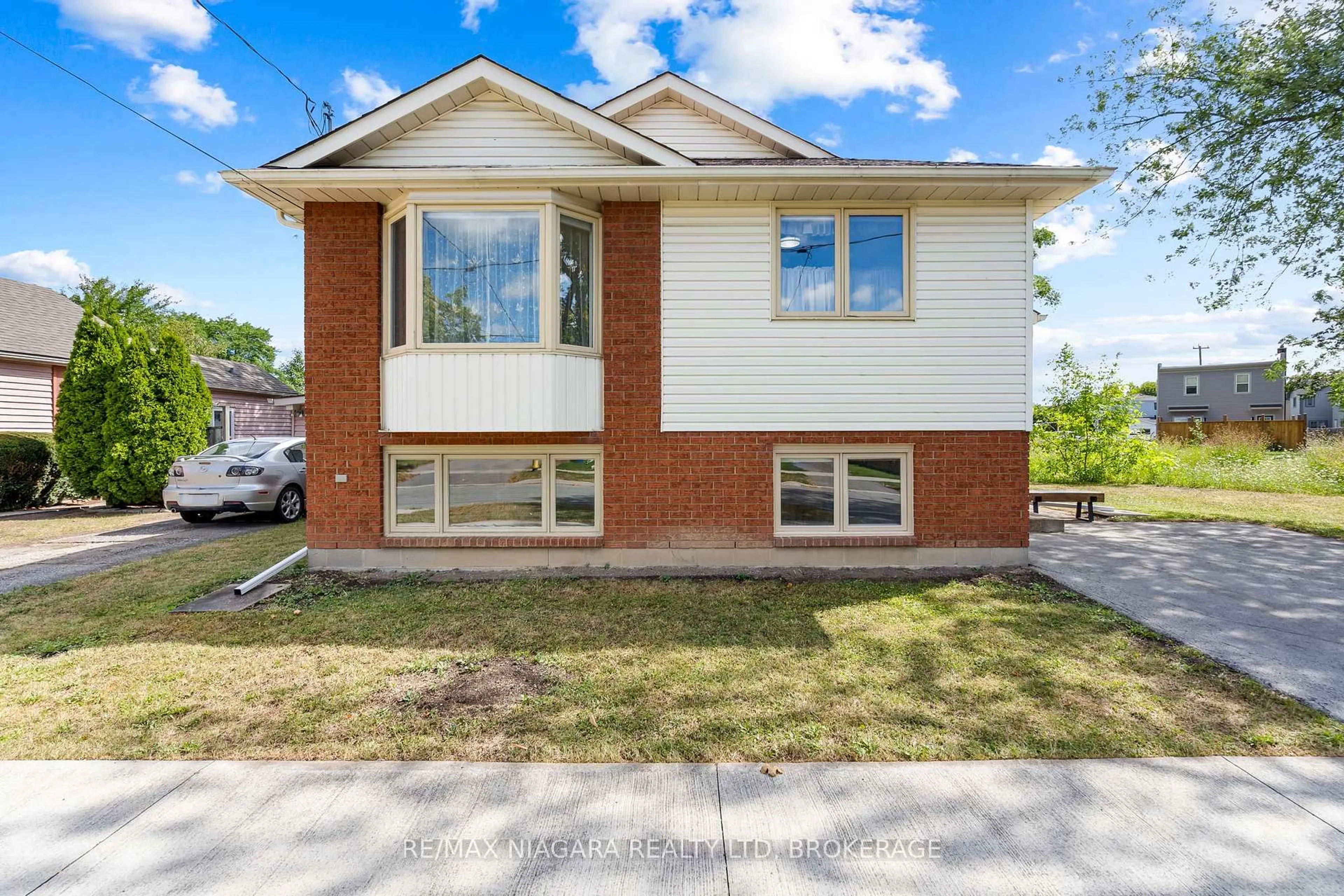 Home with brick exterior material, street for 59 Leeper St, St. Catharines Ontario L2S 2N1