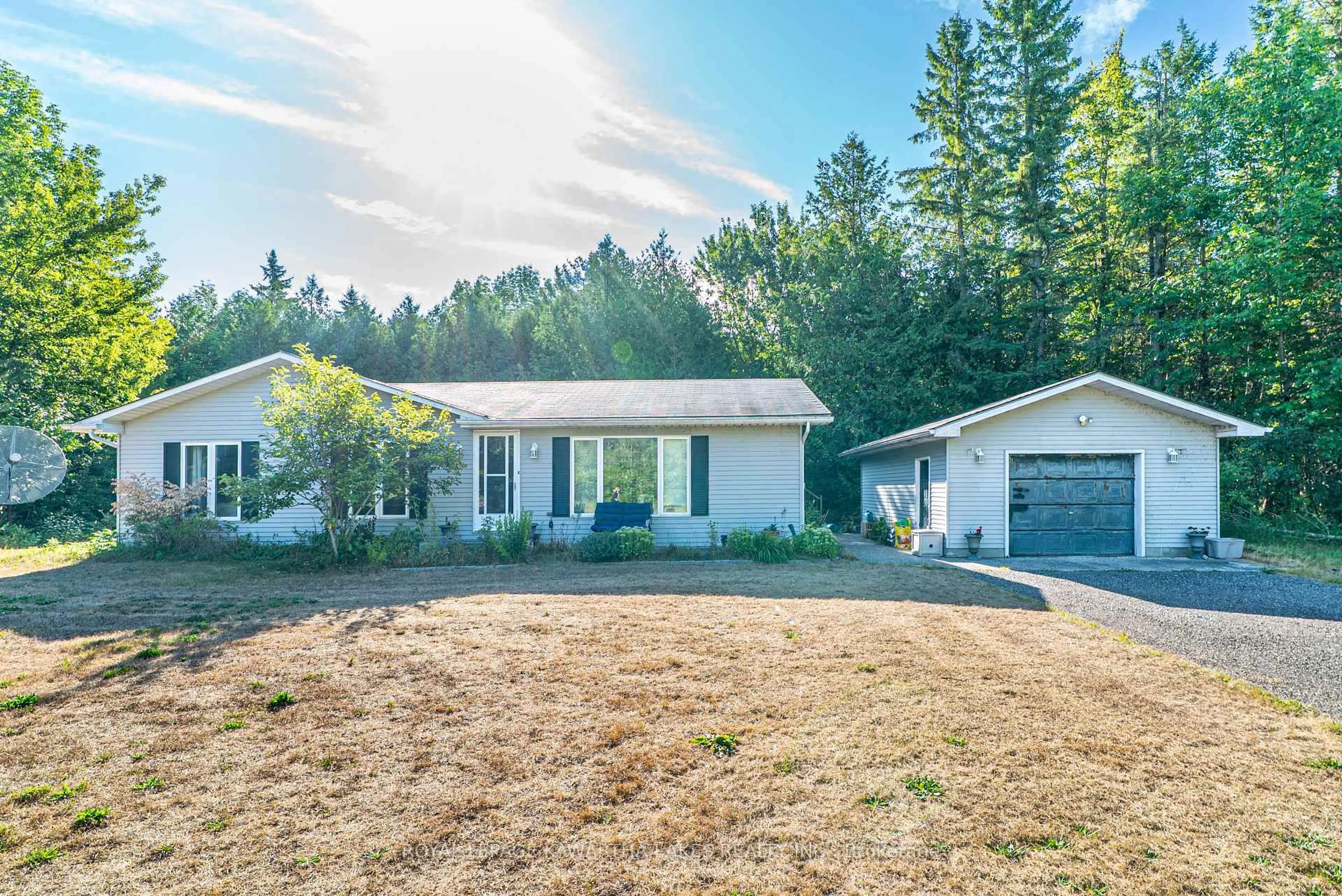 A pic from outside/outdoor area/front of a property/back of a property/a pic from drone, unknown for 518 Balsam Lake Dr, Kawartha Lakes Ontario K0M 2B0