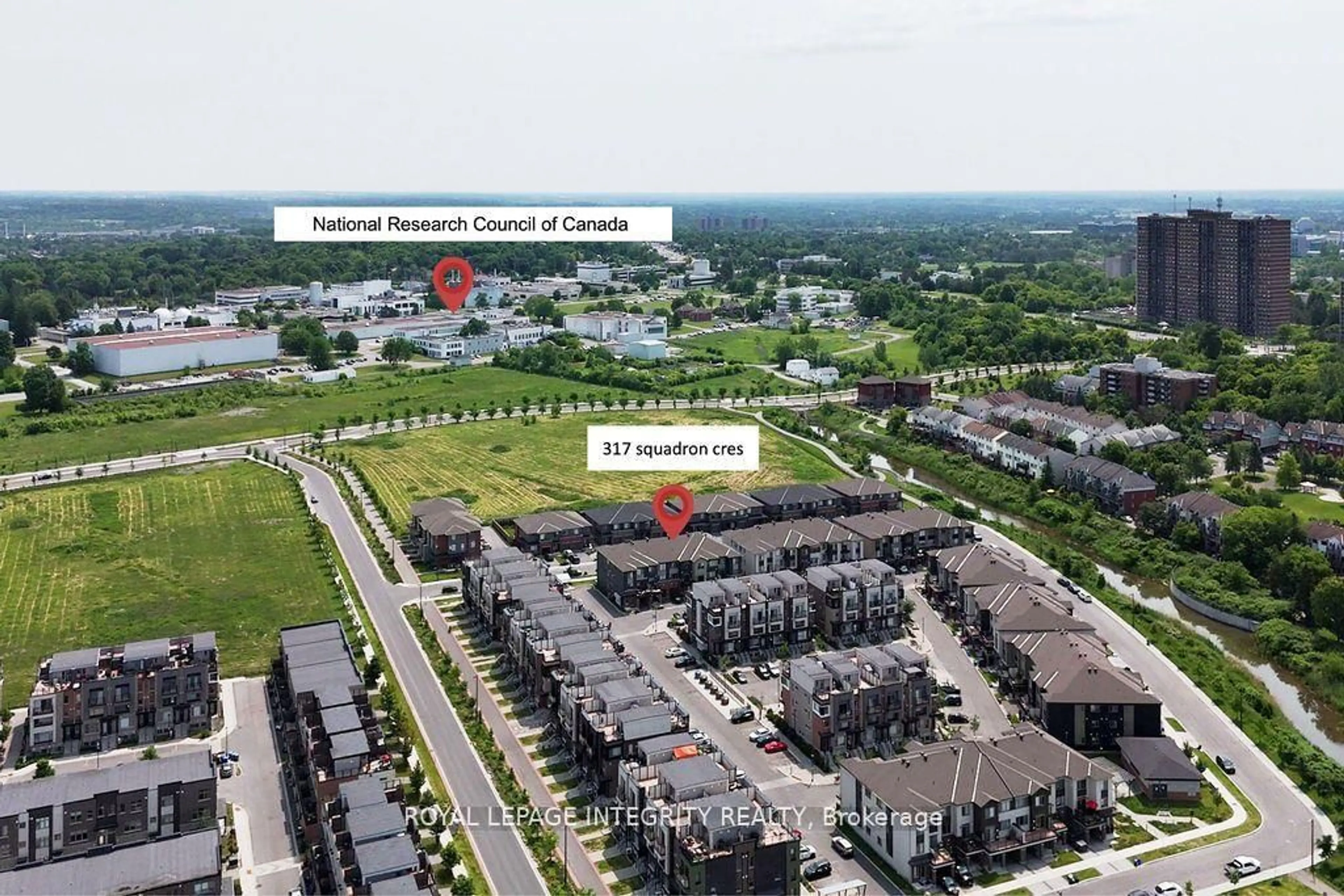 A pic from outside/outdoor area/front of a property/back of a property/a pic from drone, unknown for 317 Squadron Cres, Ottawa Ontario K1K 4Z4