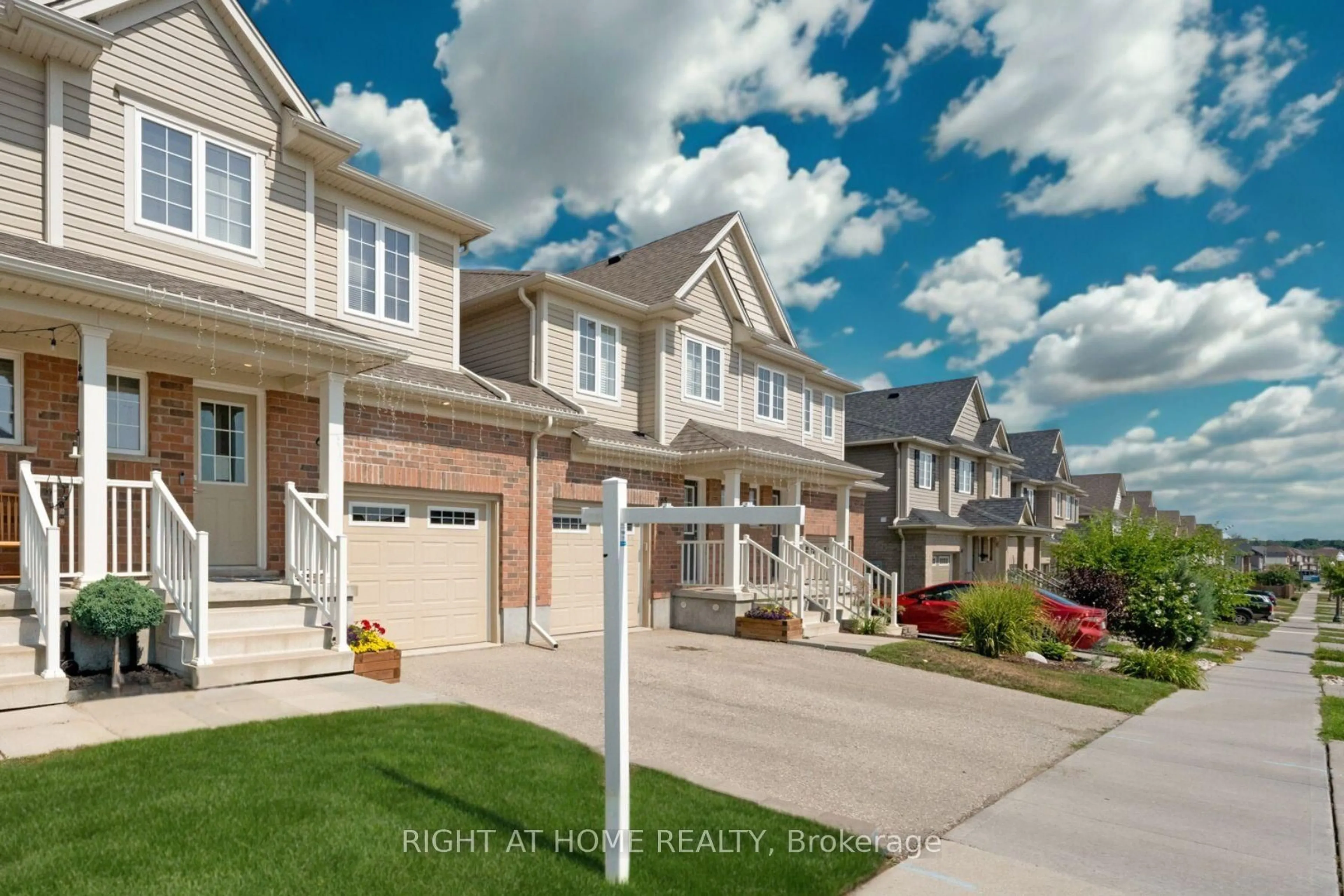 A pic from outside/outdoor area/front of a property/back of a property/a pic from drone, street for 63 Grand Flats Tr, Kitchener Ontario N2A 0J8