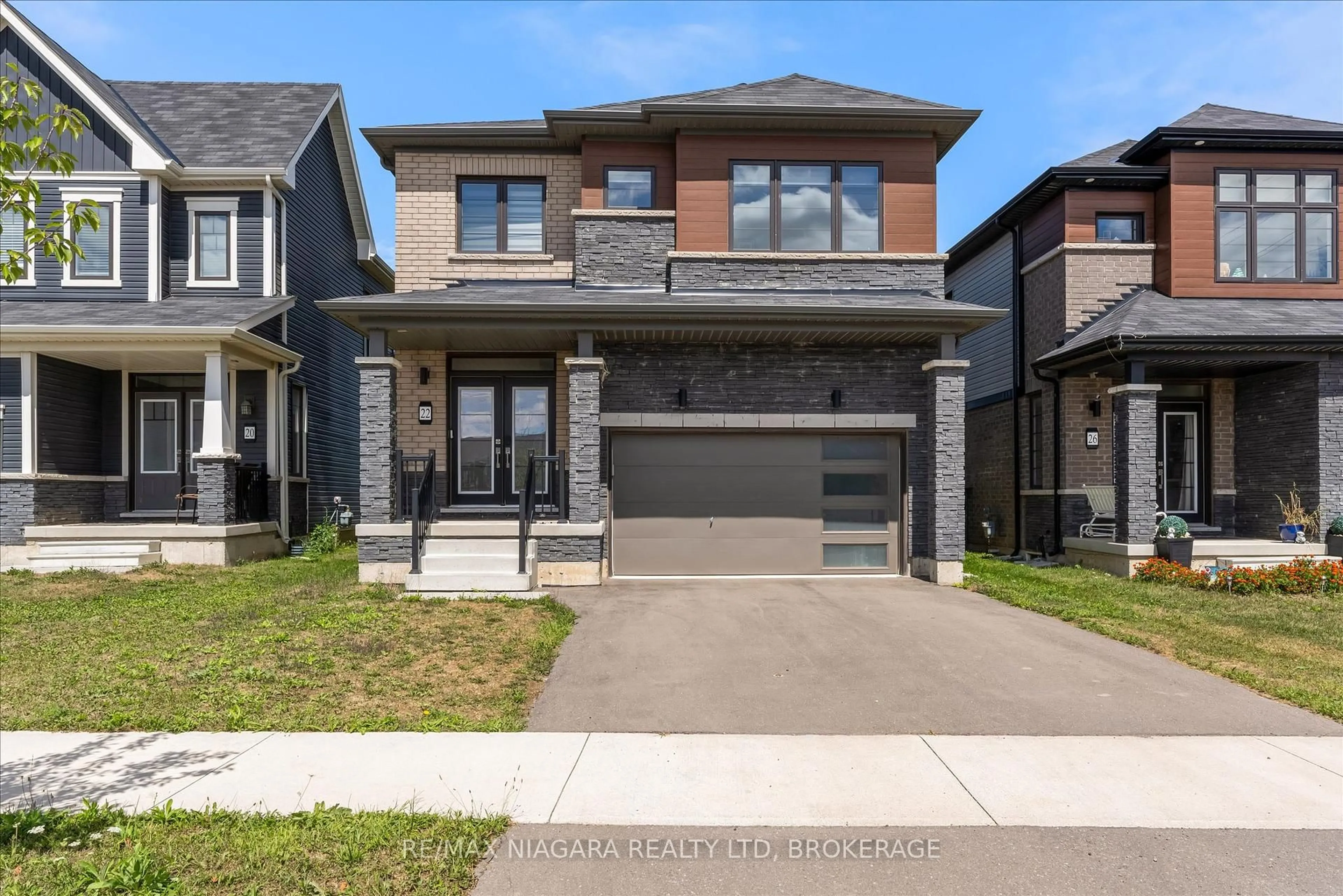 Home with brick exterior material, street for 22 PEACH St, Thorold Ontario L2E 6S4