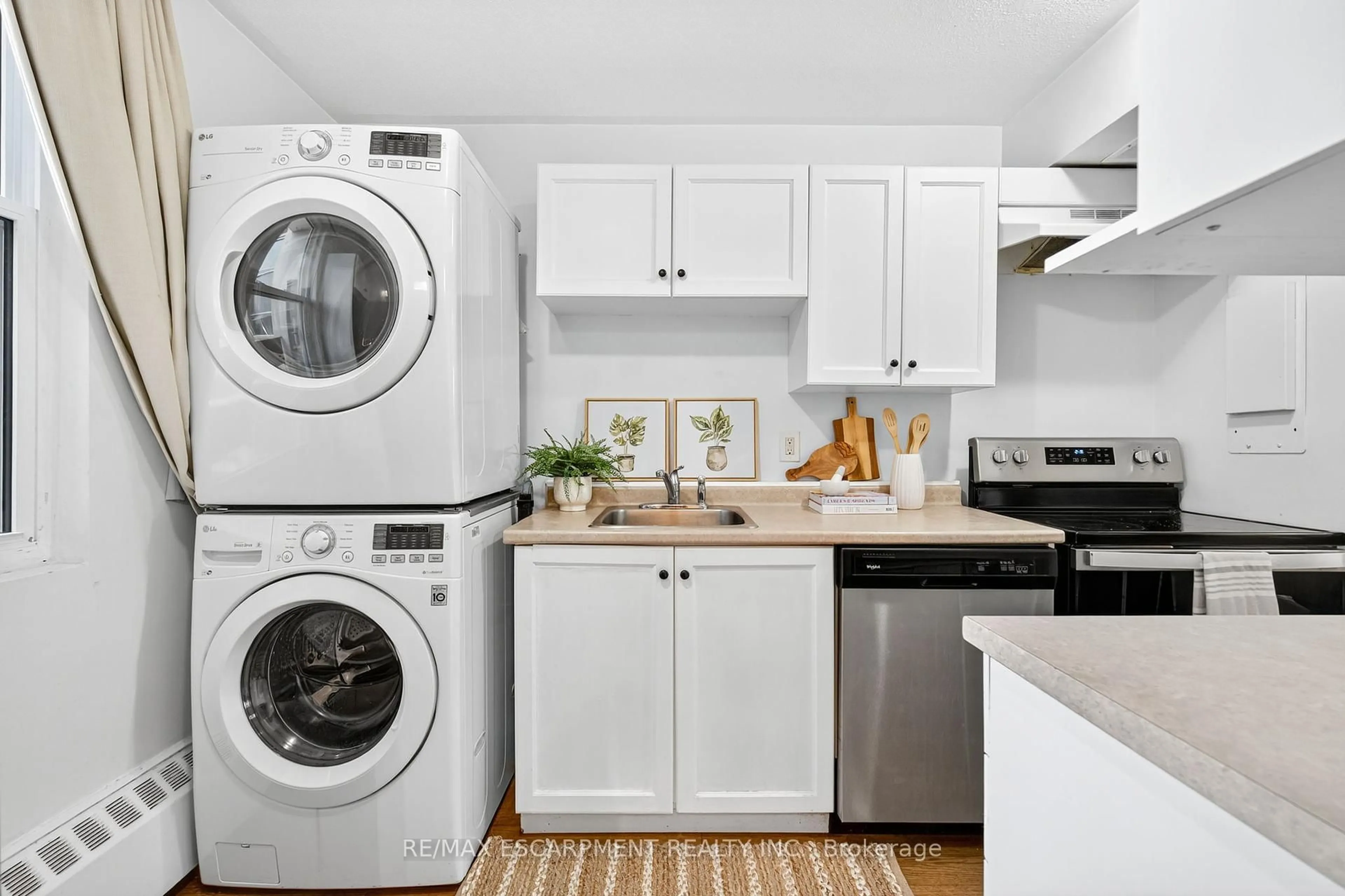 Laundry room for 350 Quigley Rd #320, Hamilton Ontario L8K 5N2