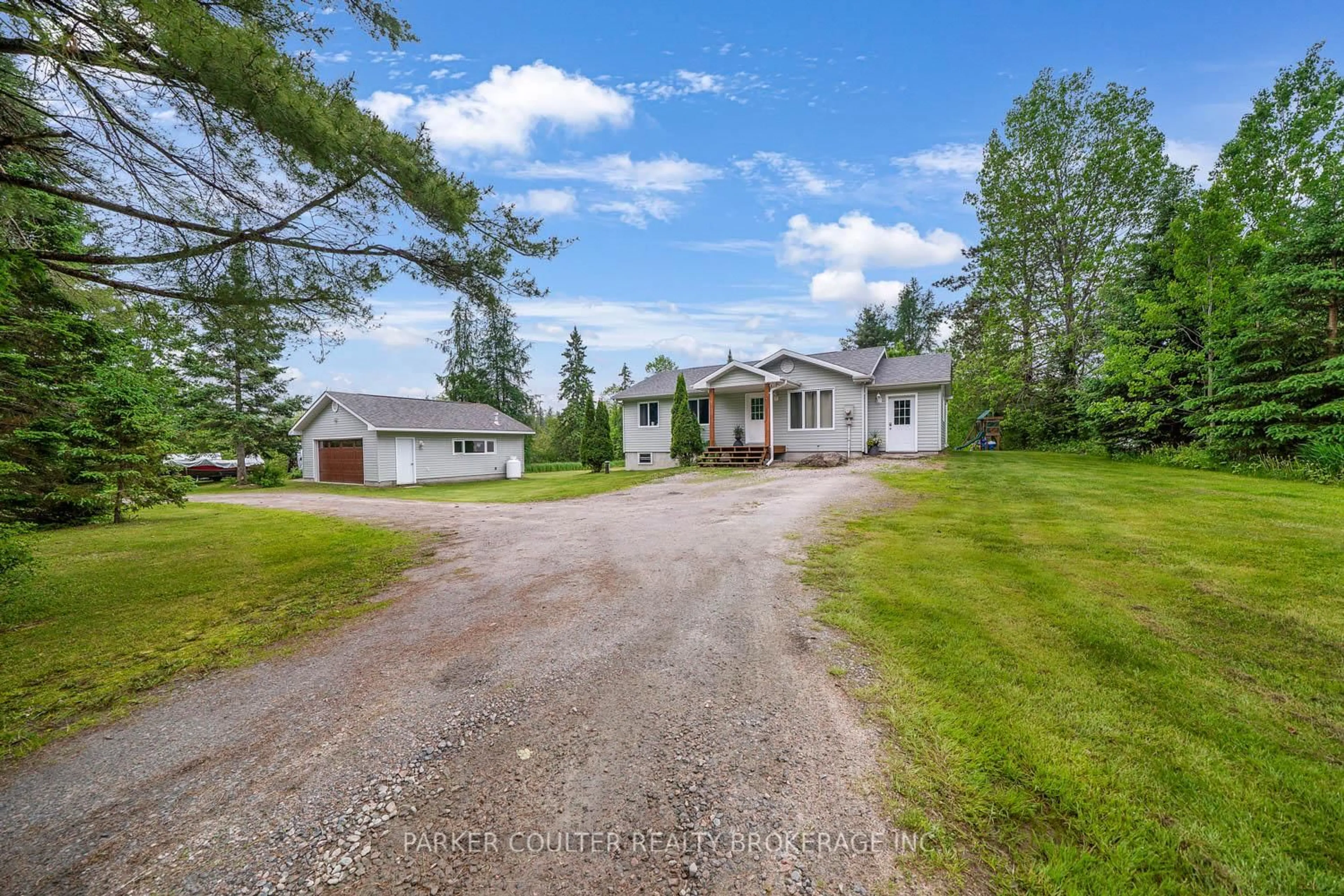 A pic from outside/outdoor area/front of a property/back of a property/a pic from drone, street for 115 Mccans Rd, Seguin Ontario P0C 1J0