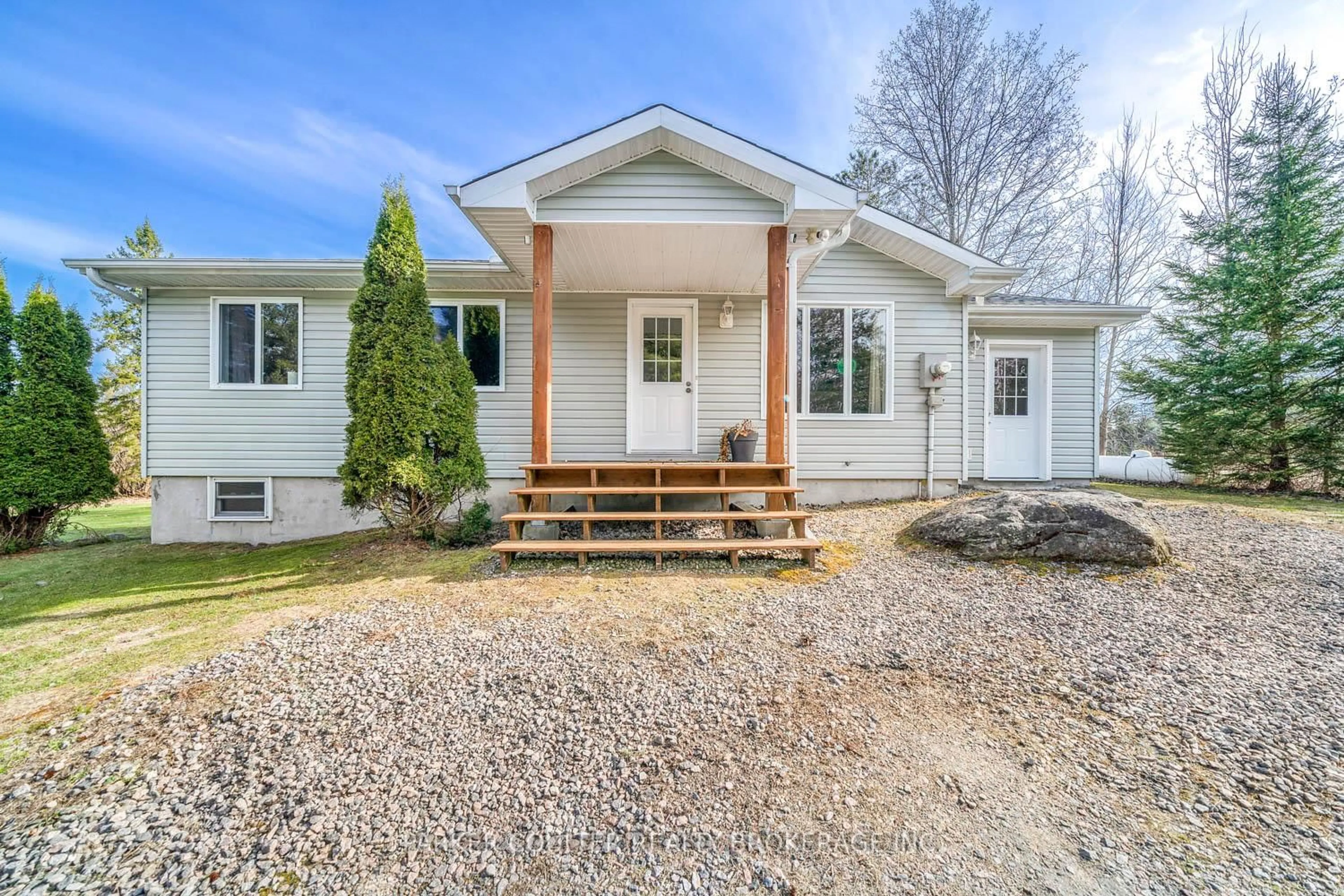 Home with vinyl exterior material, street for 115 Mccans Rd, Seguin Ontario P0C 1J0