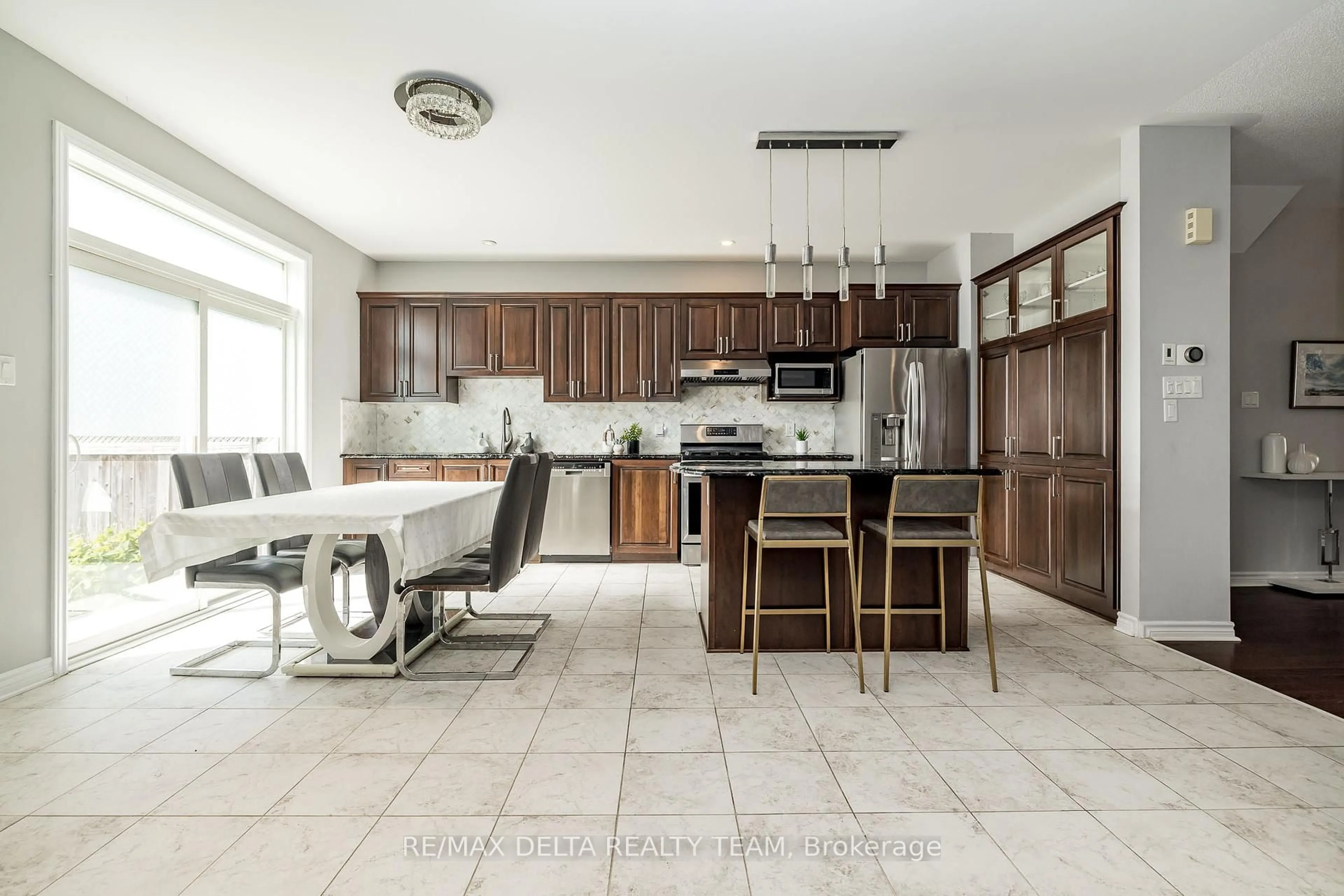 Open concept kitchen, ceramic/tile floor for 218 Enclave Walk, Ottawa Ontario K1W 0J4