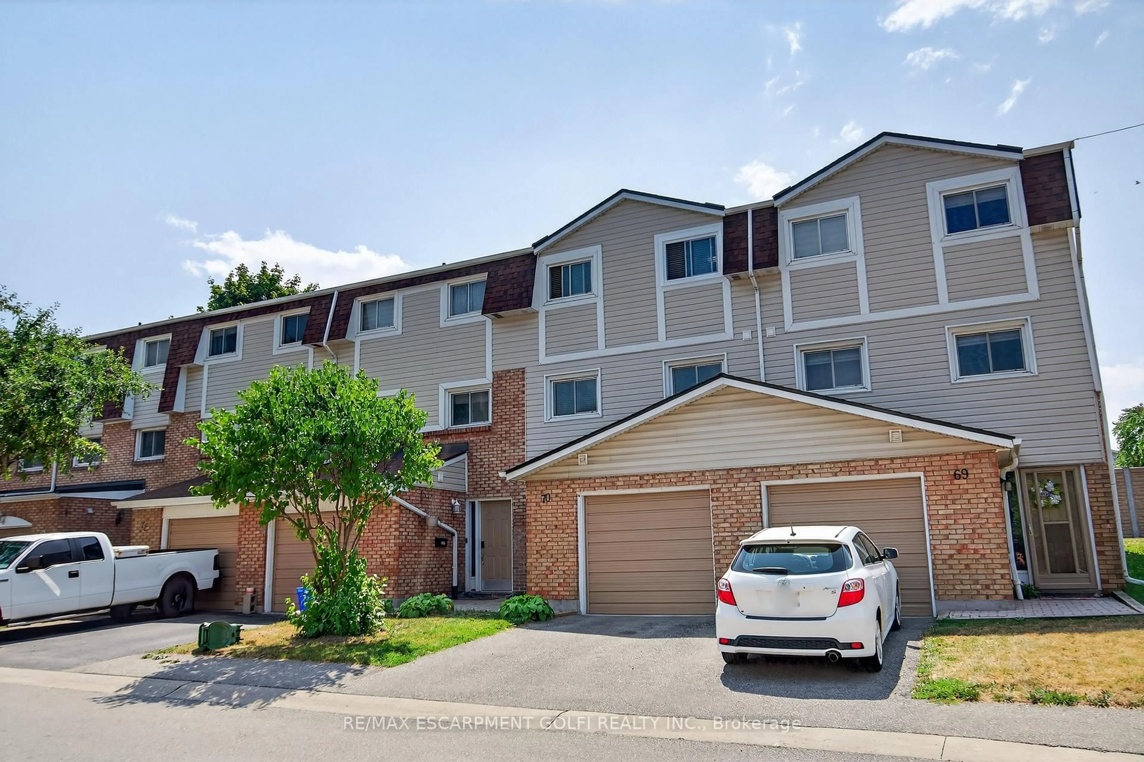 A pic from outside/outdoor area/front of a property/back of a property/a pic from drone, street for 11 Harrisford St #70, Hamilton Ontario L8K 6L7