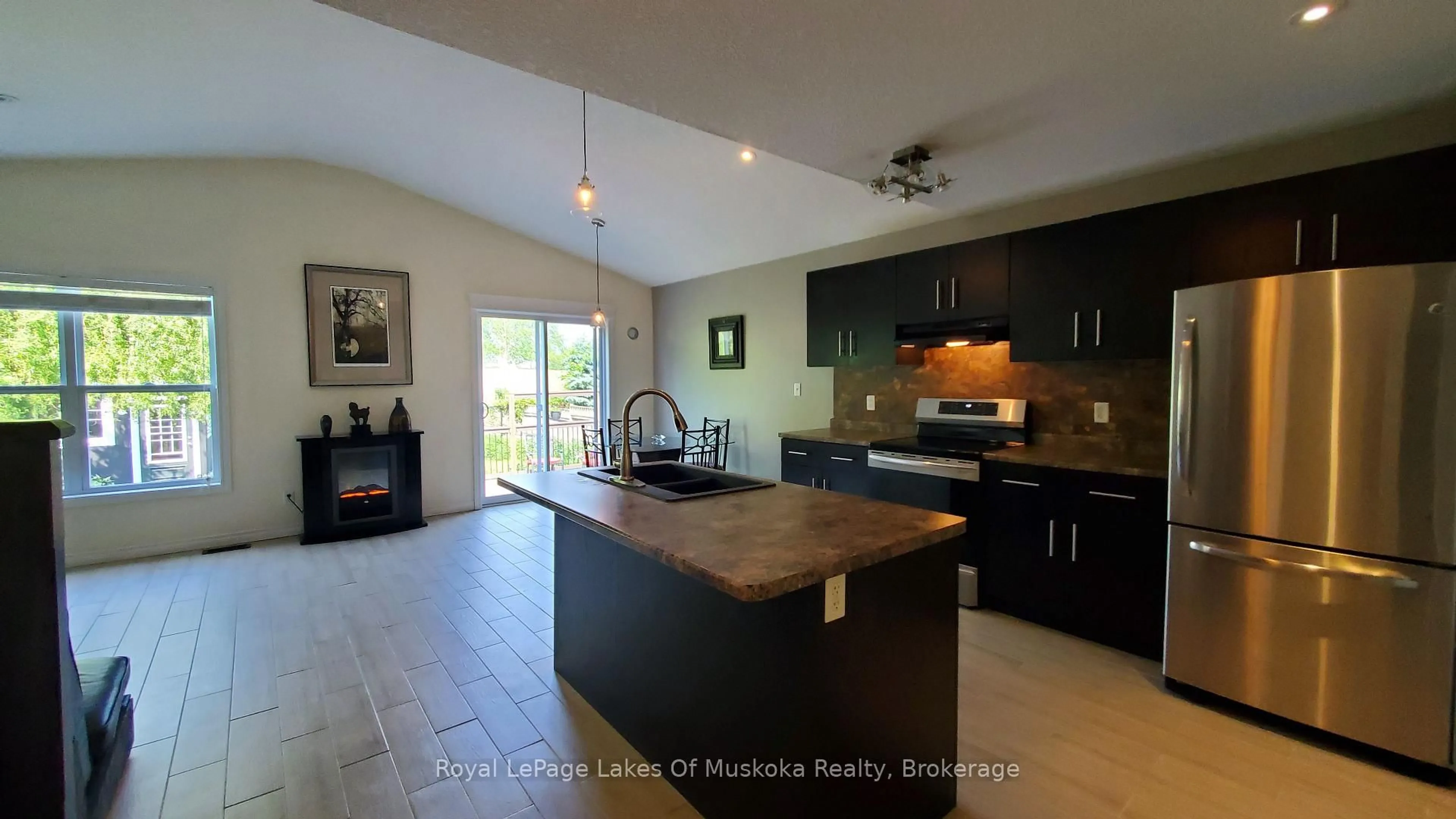 Open concept kitchen, wood/laminate floor for 89 Davis St, Guelph Ontario N1E 0G2