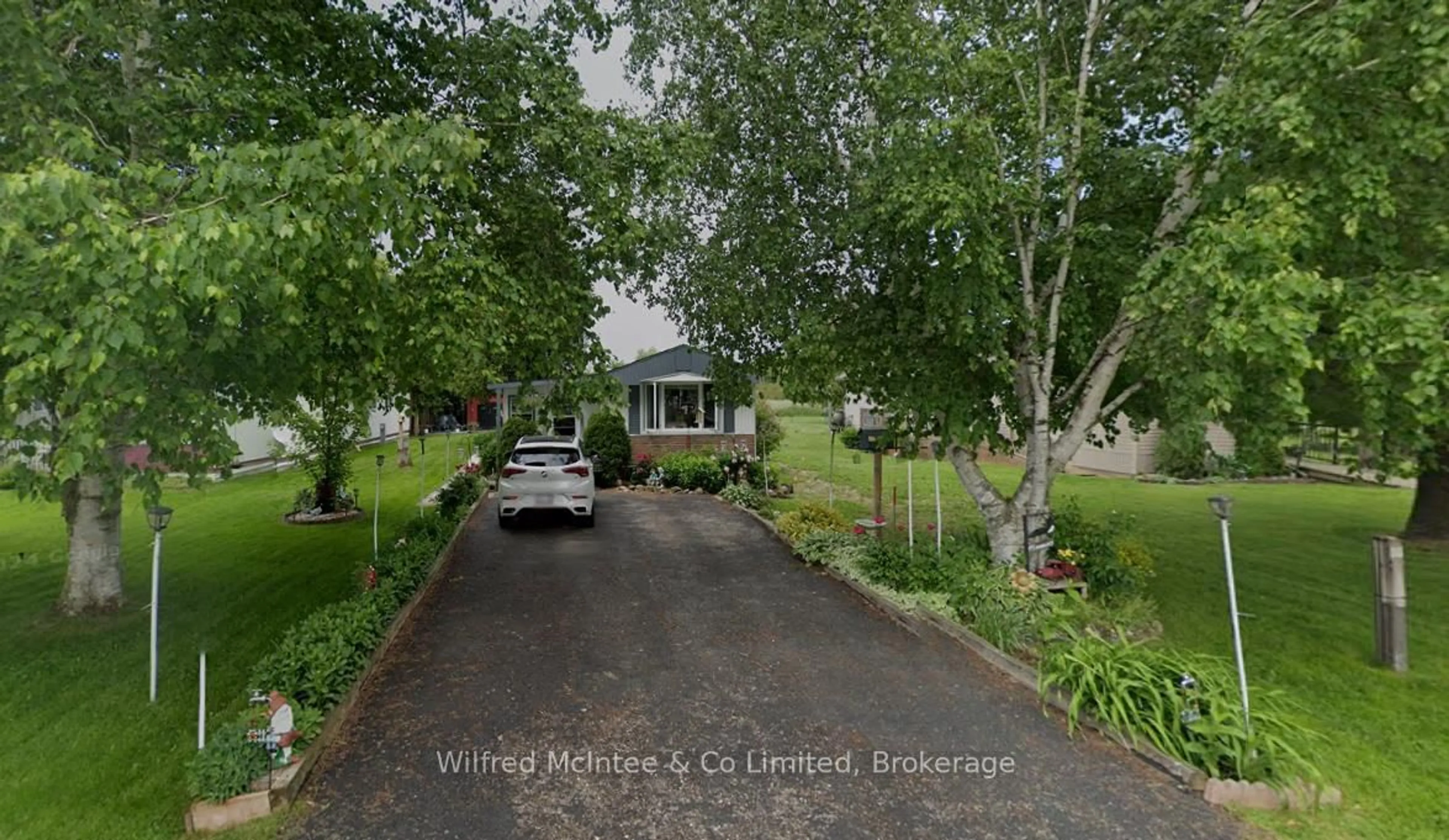 A pic from outside/outdoor area/front of a property/back of a property/a pic from drone, street for 302694 Douglas St #3, West Grey Ontario N0G 1R0