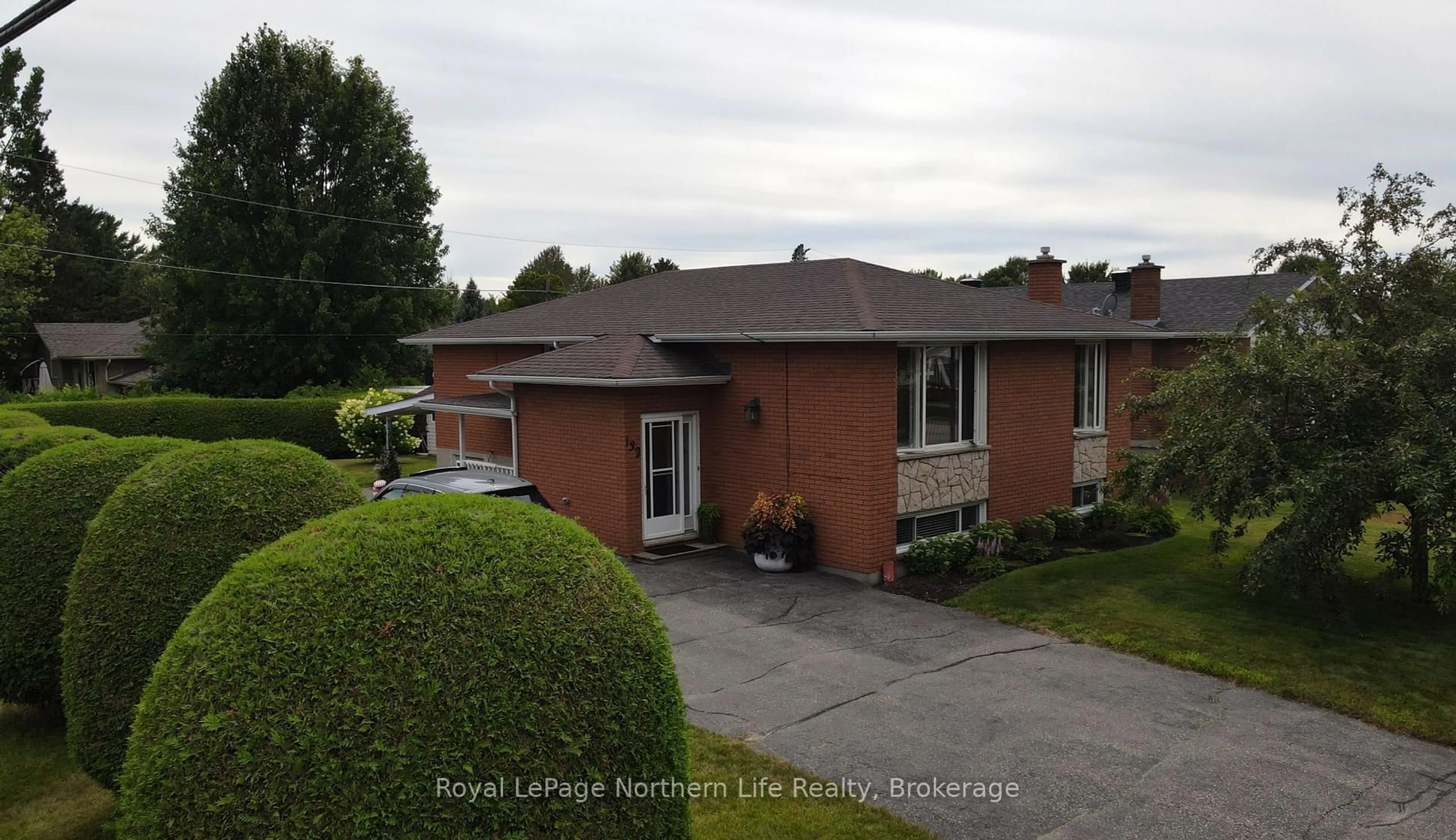 A pic from outside/outdoor area/front of a property/back of a property/a pic from drone, street for 132 Levis St, West Nipissing Ontario P2B 3E3