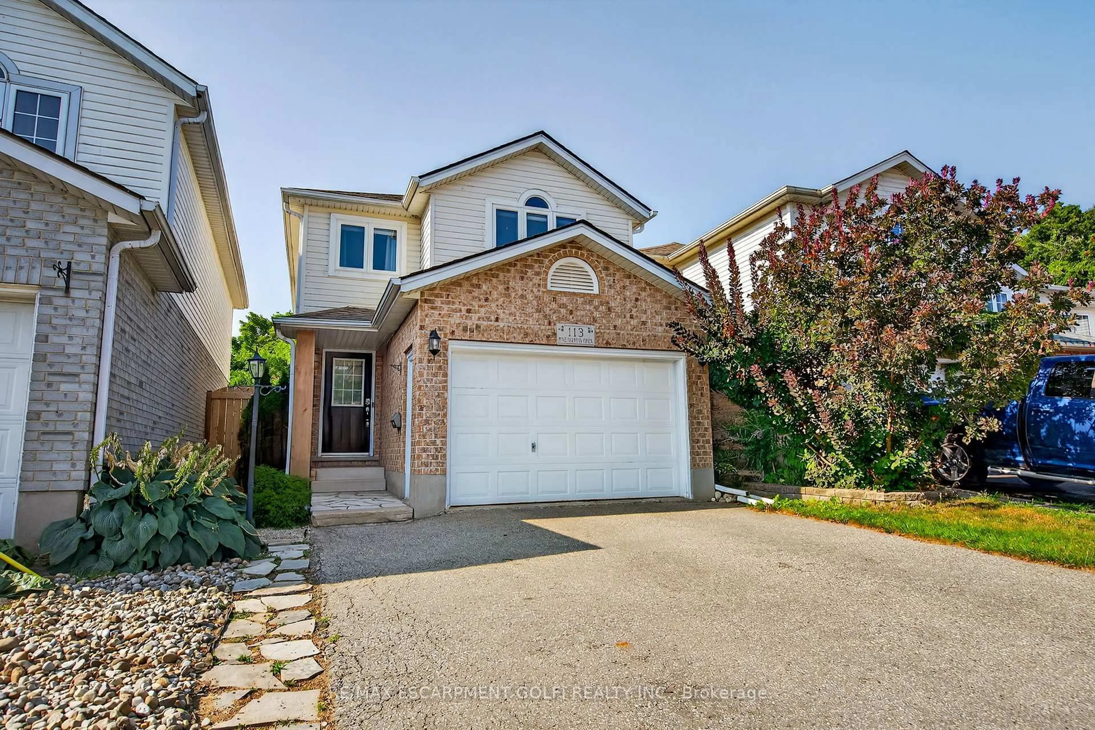 Home with brick exterior material, street for 113 Pine Martin Cres, Kitchener Ontario N2E 3S3