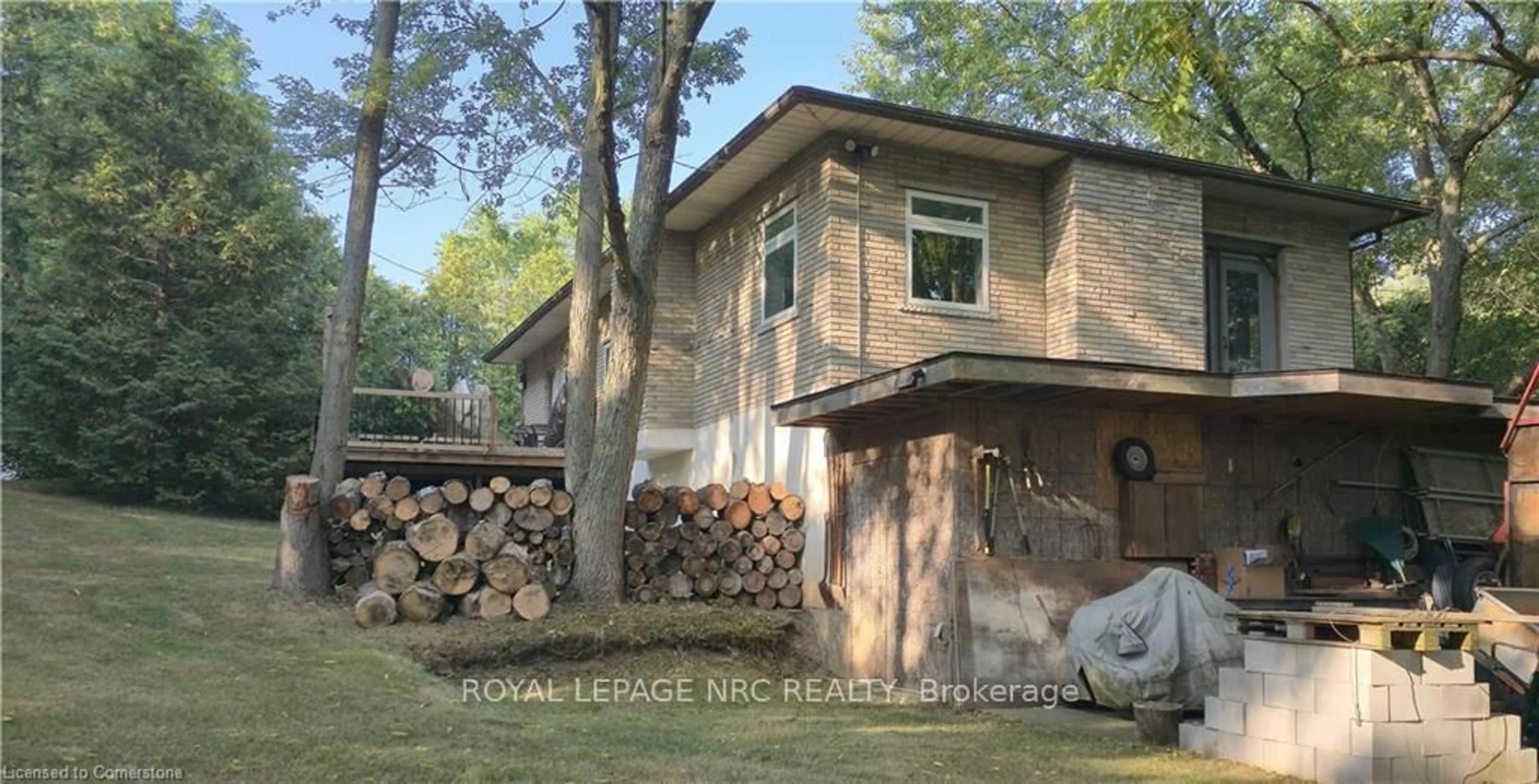 Home with brick exterior material, unknown for 165 Ridge Rd, Grimsby Ontario L3M 4E7
