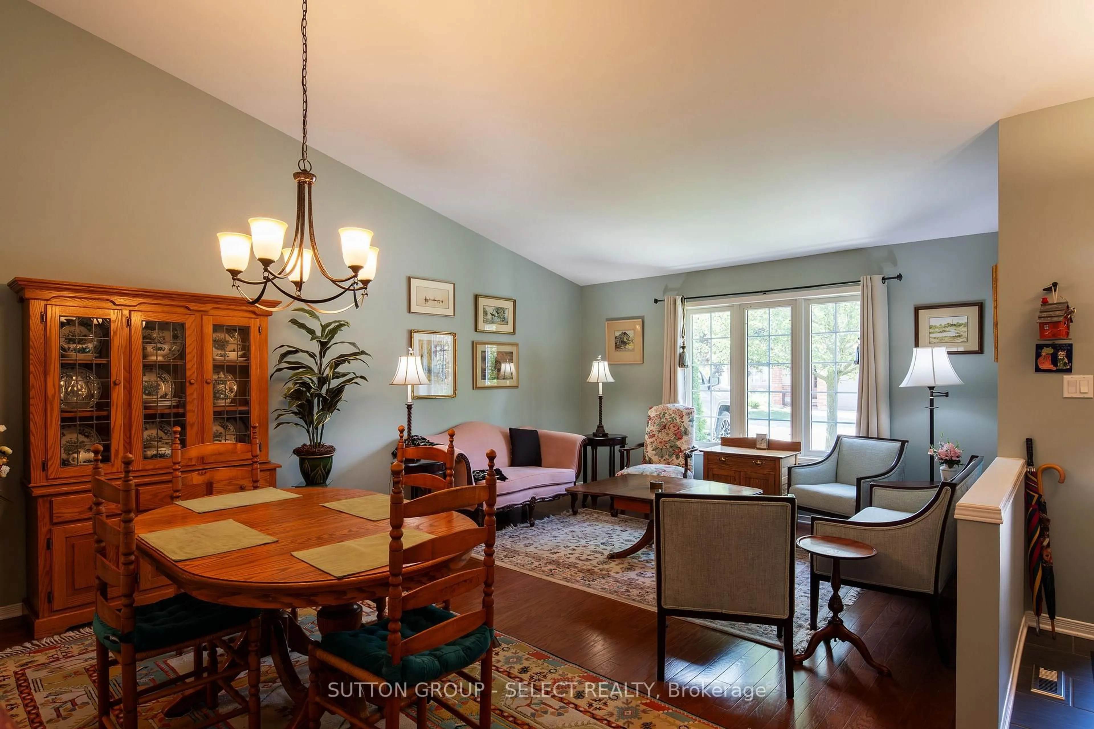Living room with furniture, wood/laminate floor for 1100 BYRON BASELINE Rd #66, London South Ontario N6K 4M3